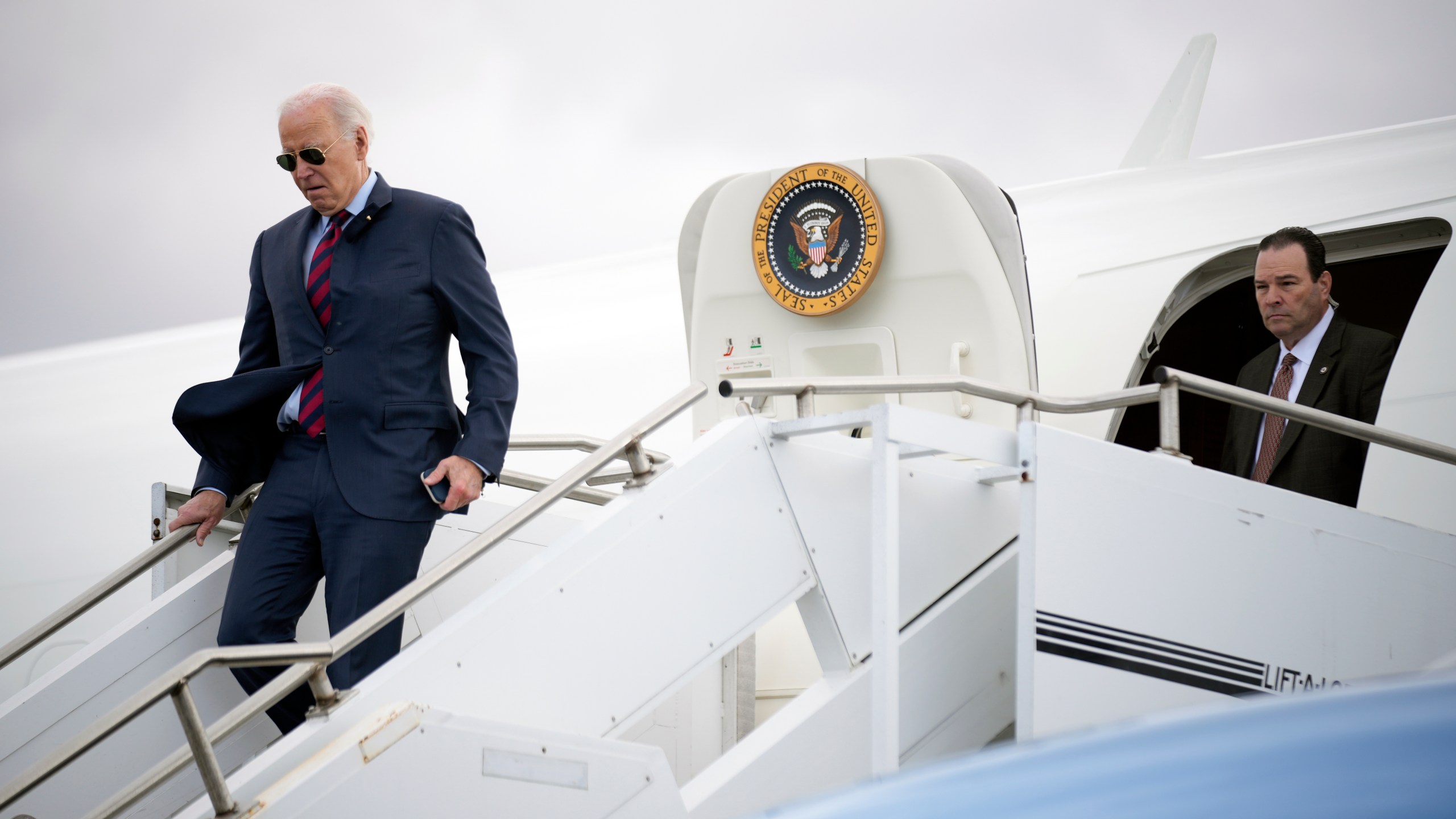 President Joe Biden arrives at Philadelphia International Airport, Monday, Dec. 11, 2023. (AP Photo/Andrew Harnik)