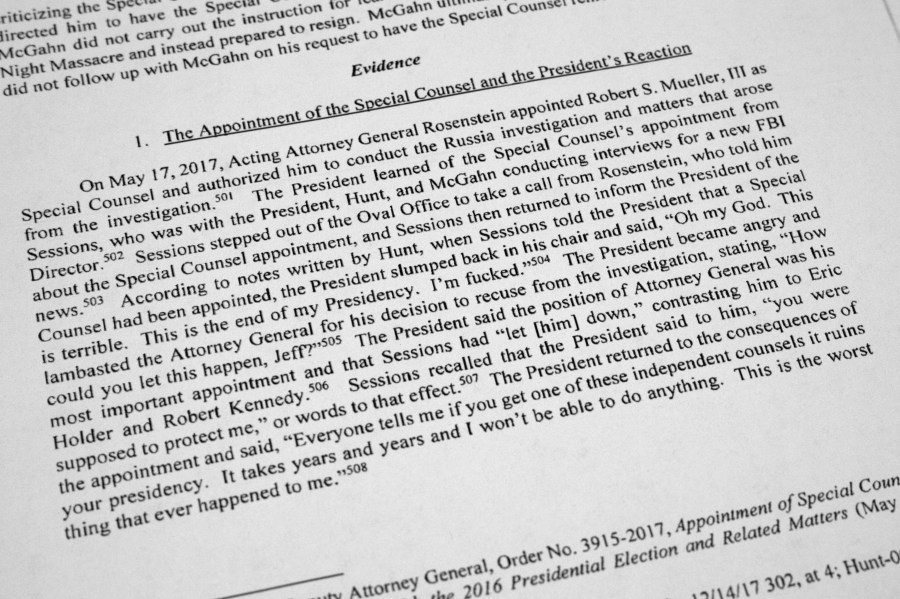 FILE - This portion of special counsel Robert Mueller's report on the investigation into Russian interference in the 2016 presidential election, released in Washington, and photographed on April 18, 2019, describes Mueller's appointment and President Donald Trump's reaction to it. Federal prosecutors and lawyers for Donald Trump have signaled their desire to invoke the 2016 election in the former president's trial on charges of scheming to overturn the results of the 2020 presidential election. (AP Photo/Jon Elswick, File)