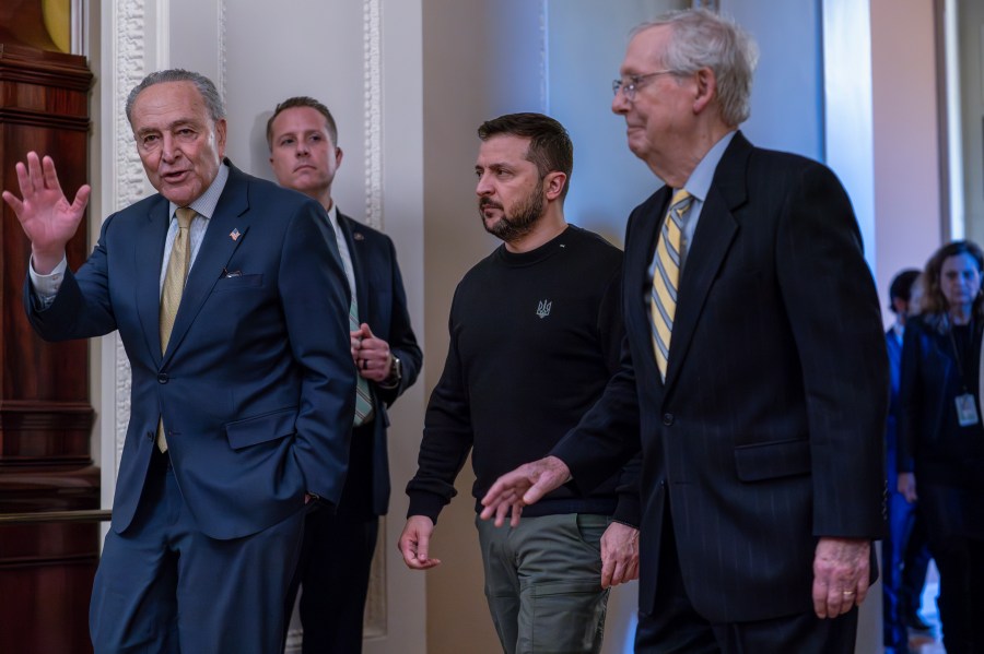 From left, Senate Majority Leader Chuck Schumer, D-N.Y., Ukrainian President Volodymyr Zelenskyy, and Minority Leader Mitch McConnell, R-Ky., leave a meeting at the Capitol in Washington where Zelenskyy implored Congress to break its deadlock and approve continued wartime funding for Ukraine, Tuesday, Dec. 12, 2023. (AP Photo/J. Scott Applewhite)