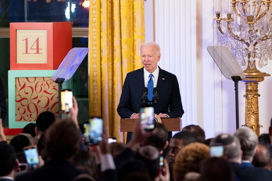 President Joe Biden speaks at a Hanukkah reception in the East Room of the White House in Washington, Monday, Dec. 11, 2023.(Bonnie Cash/Pool via AP)