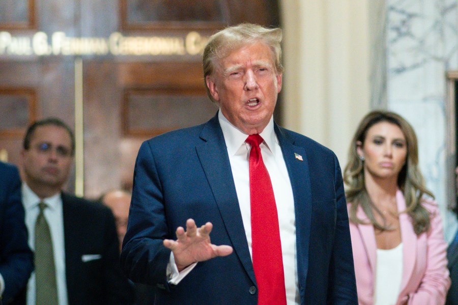 Former President Donald Trump speaks after exiting the courtroom for a break at New York Supreme Court, Thursday, Dec. 7, 2023, in New York. (AP Photo/Eduardo Munoz Alvarez)