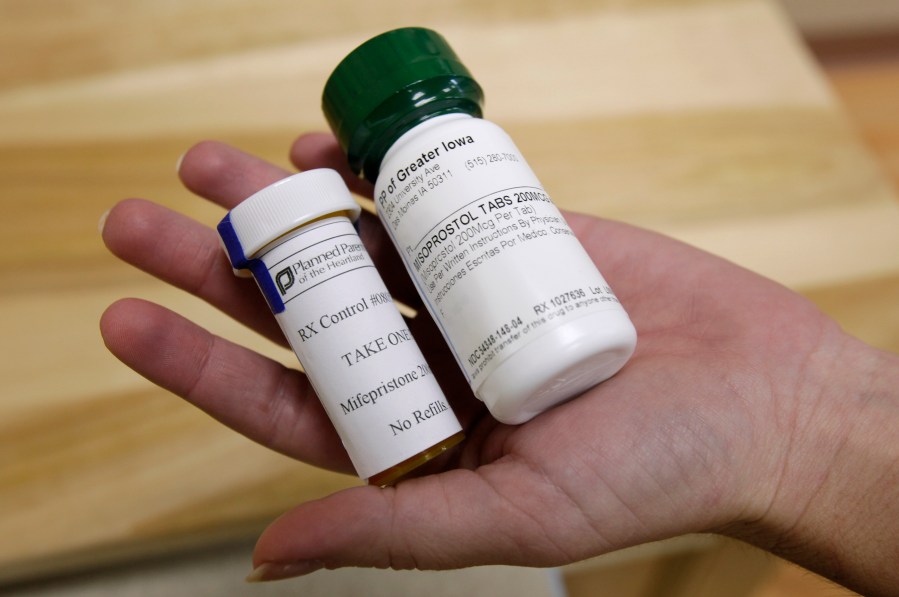 FILE - Bottles of abortion pills mifepristone, left, and misoprostol, right, at a clinic in Des Moines, Iowa, on Sept. 22, 2010. Medication abortion is the preferred method of ending pregnancy in the U.S., and one of the two drugs use — mifepristone — will now go in front of the U.S. Supreme Court in 2024. As states have imposed bans or restrictions or seek to limit abortions after Roe v. Wade was overturned in June 2022, demand for the abortion pills mifepristone and misoprostol have grown. (AP Photo/Charlie Neibergall, File)