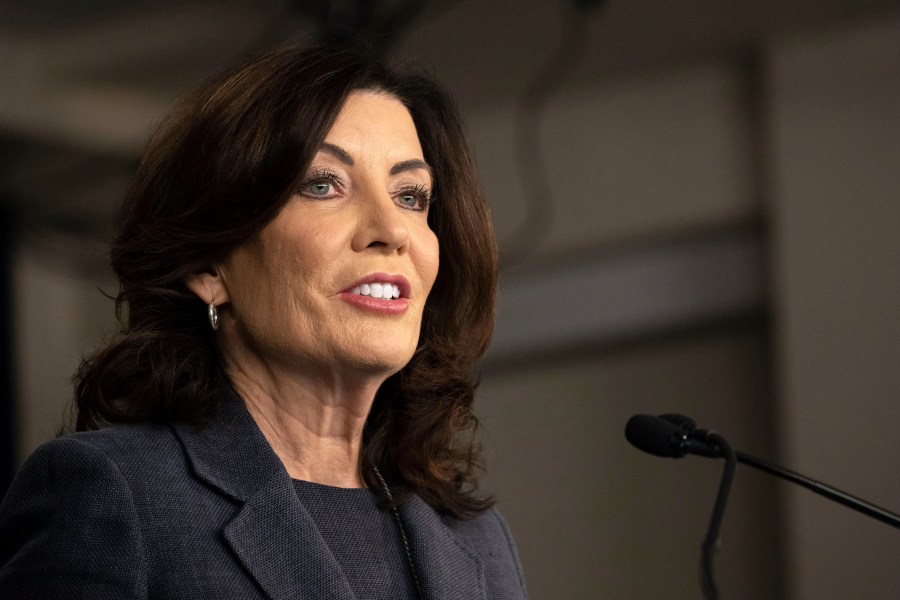 FILE - New York Gov. Kathy Hochul addresses the media during a press conference in New York, Monday, March. 13, 2023. New York's hospitals and healthcare providers are now banned from reporting medical debt to credit agencies, after Gov. Hochul signed into law a series of consumer protection bills on Wednesday, Dec. 13. (AP Photo/Yuki Iwamura, File)