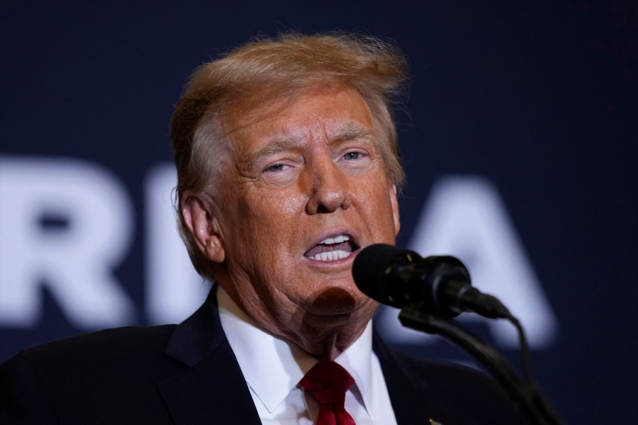 Former President Donald Trump speaks during a commit to caucus rally, Wednesday, Dec. 13, 2023, in Coralville, Iowa. (AP Photo/Charlie Neibergall)