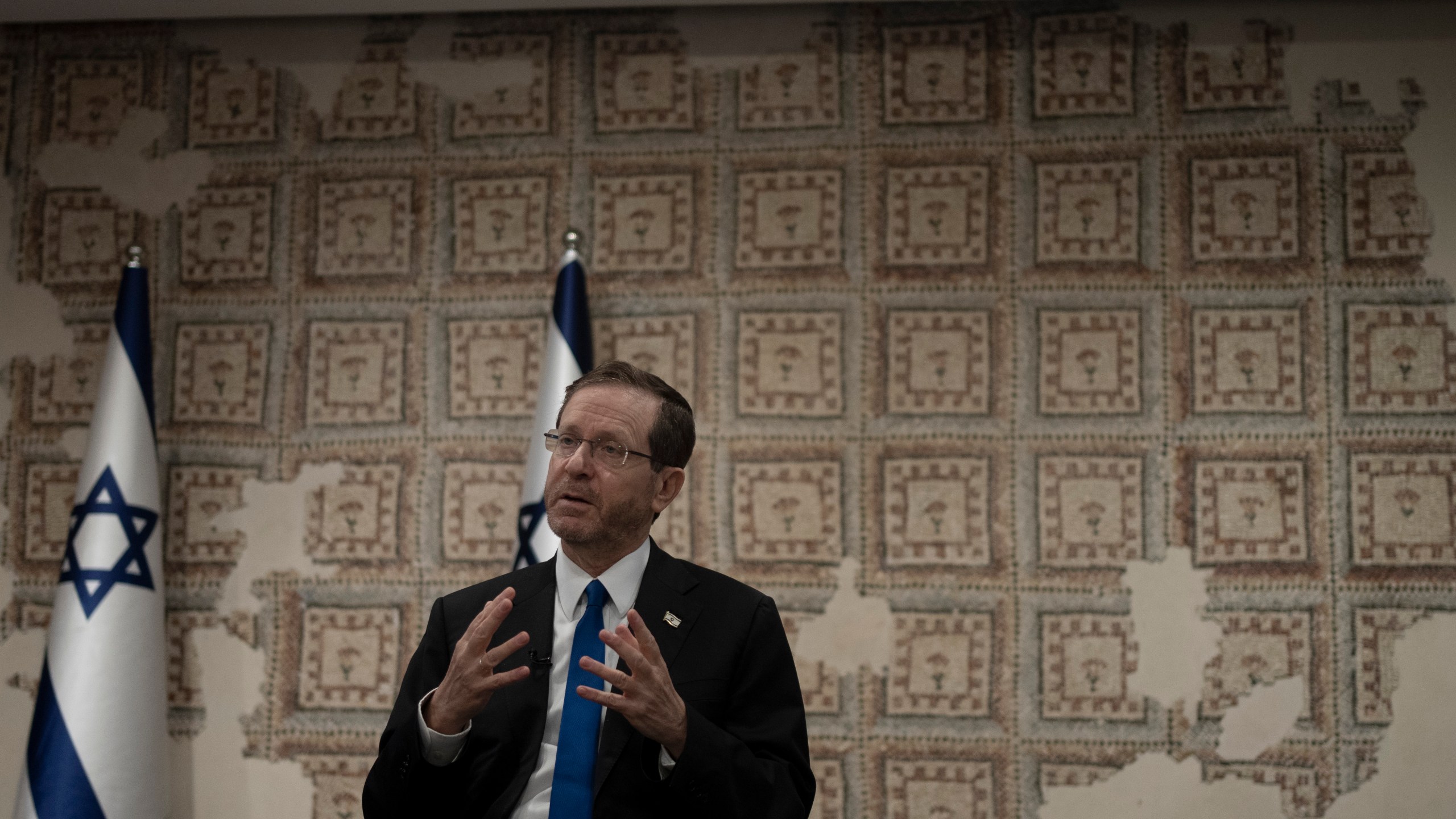 Israel's President Isaac Herzog speaks during an interview at his official residence in Jerusalem, Thursday, Dec. 14, 2023. (AP Photo/Maya Alleruzzo)