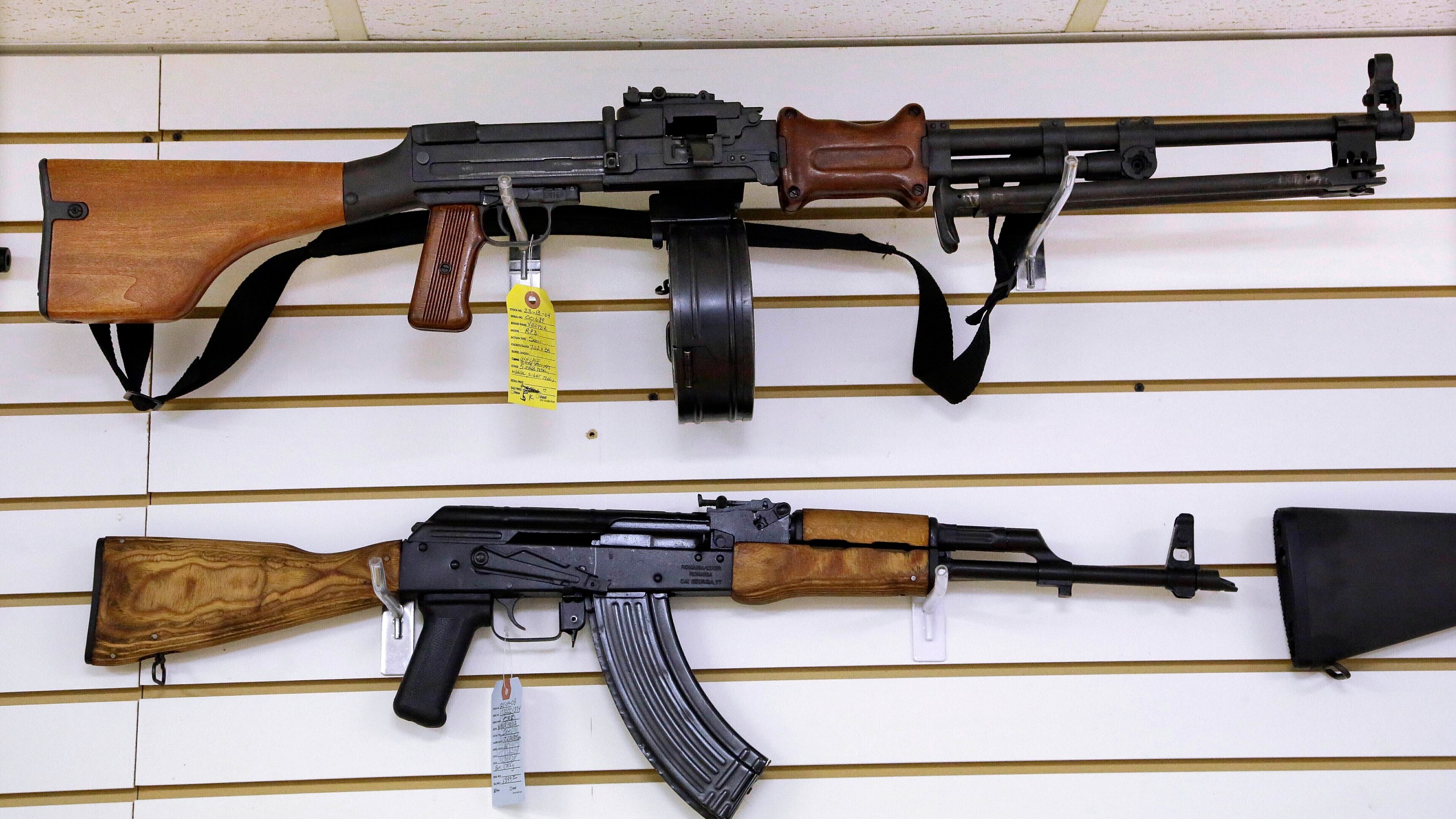 FILE - Assault-style weapons are displayed for sale at Capitol City Arms Supply on Jan. 16, 2013, in Springfield, Ill. The Supreme Court on Thursday, Dec. 14, 2023, declined to put on hold a new Illinois law that would ban high-power semiautomatic weapons like the one used in the mass killing of seven people at a 2022 parade in a Chicago suburb. (AP Photo/Seth Perlman, File)