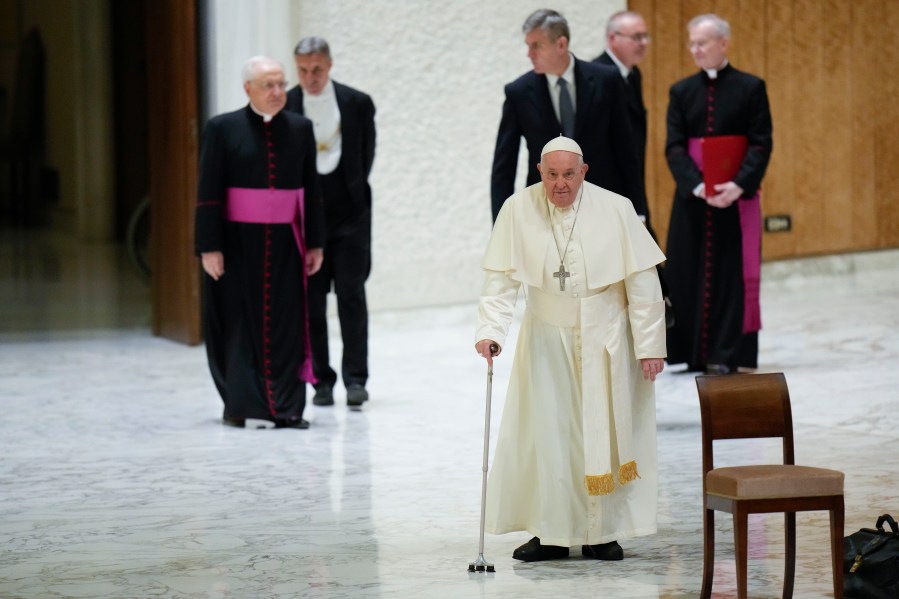 Pope Francis arrives for an audience with sick people and Lourdes pilgrimage operators in the Paul VI Hall, at the Vatican, Thursday, Dec. 14, 2023. (AP Photo/Alessandra Tarantino)