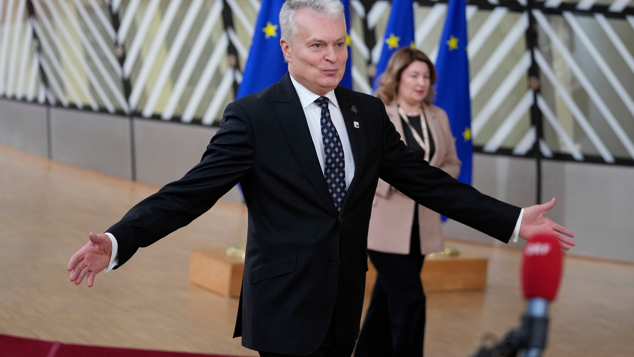 Lithuania's President Gitanas Nauseda arrives for an EU summit at the European Council building in Brussels, Thursday, Dec. 14, 2023. European Union leaders, in a two-day summit will discuss the latest developments in Russia's war of aggression against Ukraine and continued EU support for Ukraine and its people. (AP Photo/Virginia Mayo)