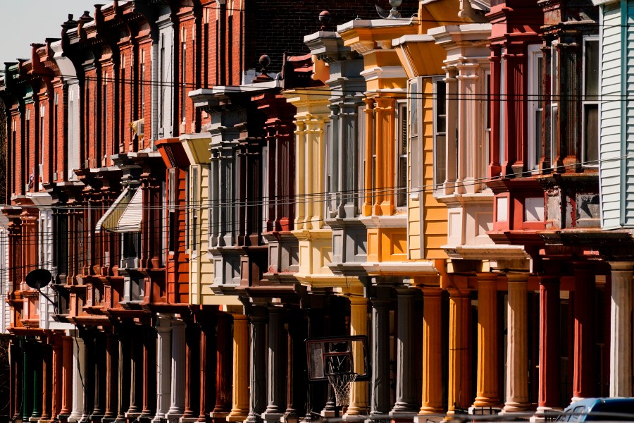 File - Row houses in Philadelphia are shown on April 8, 2022. In 2023, higher interest rates left their mark in the U.S. housing market. Sales of previously occupied U.S. homes slumped in October to their slowest pace in more than 13 years. (AP Photo/Matt Rourke, File)