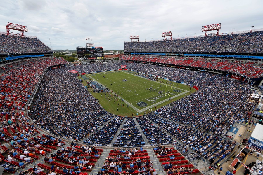 FILE - The Tennessee Titans play an NFL football game against the Houston Texans at Nissan Stadium in Nashville, Tenn., Sept. 16, 2018. Proposals for new and improved sports stadiums are proliferating across the U.S. — and could come with a hefty price tag for taxpayers. The Titans new $2.1 billion domed stadium includes $760 million in local bonds the Nashville City Council approved to go with $500 million in state bonds.(AP Photo/James Kenney, File)