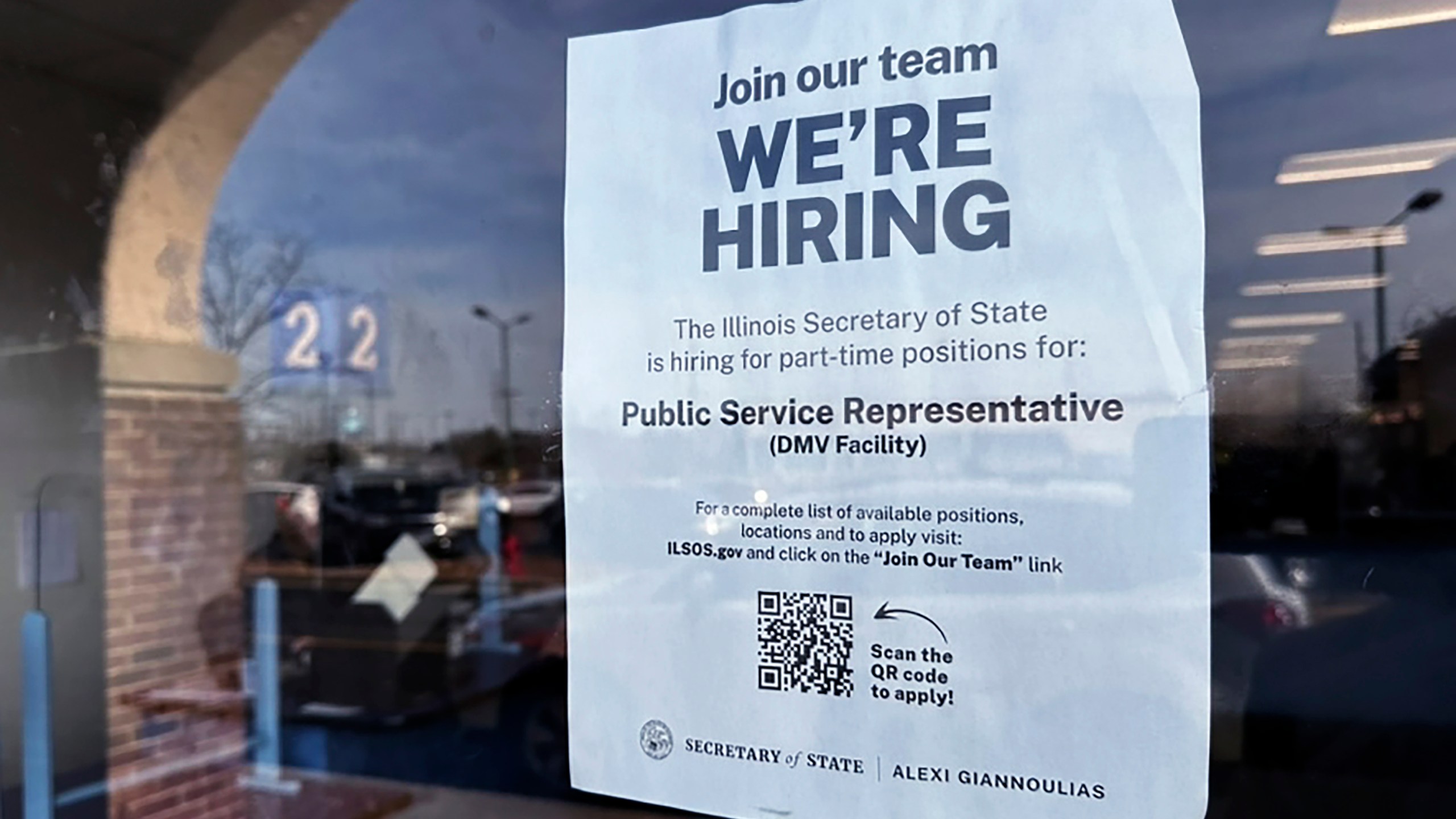 A hiring sign is displayed at the Department of Motor Vehicles office in Deerfield, Ill., Tuesday, Dec.12, 2023. On Thursday, the Labor Department reports on the number of people who applied for unemployment benefits last week. (AP Photo/Nam Y. Huh)