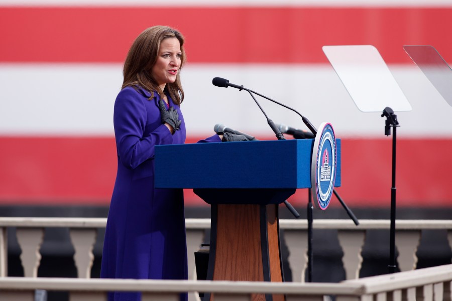 FILE - Michigan Secretary of State Jocelyn Benson addresses the crowd during inauguration ceremonies, Jan. 1, 2023, outside the state Capitol in Lansing, Mich. (AP Photo/Al Goldis, File)