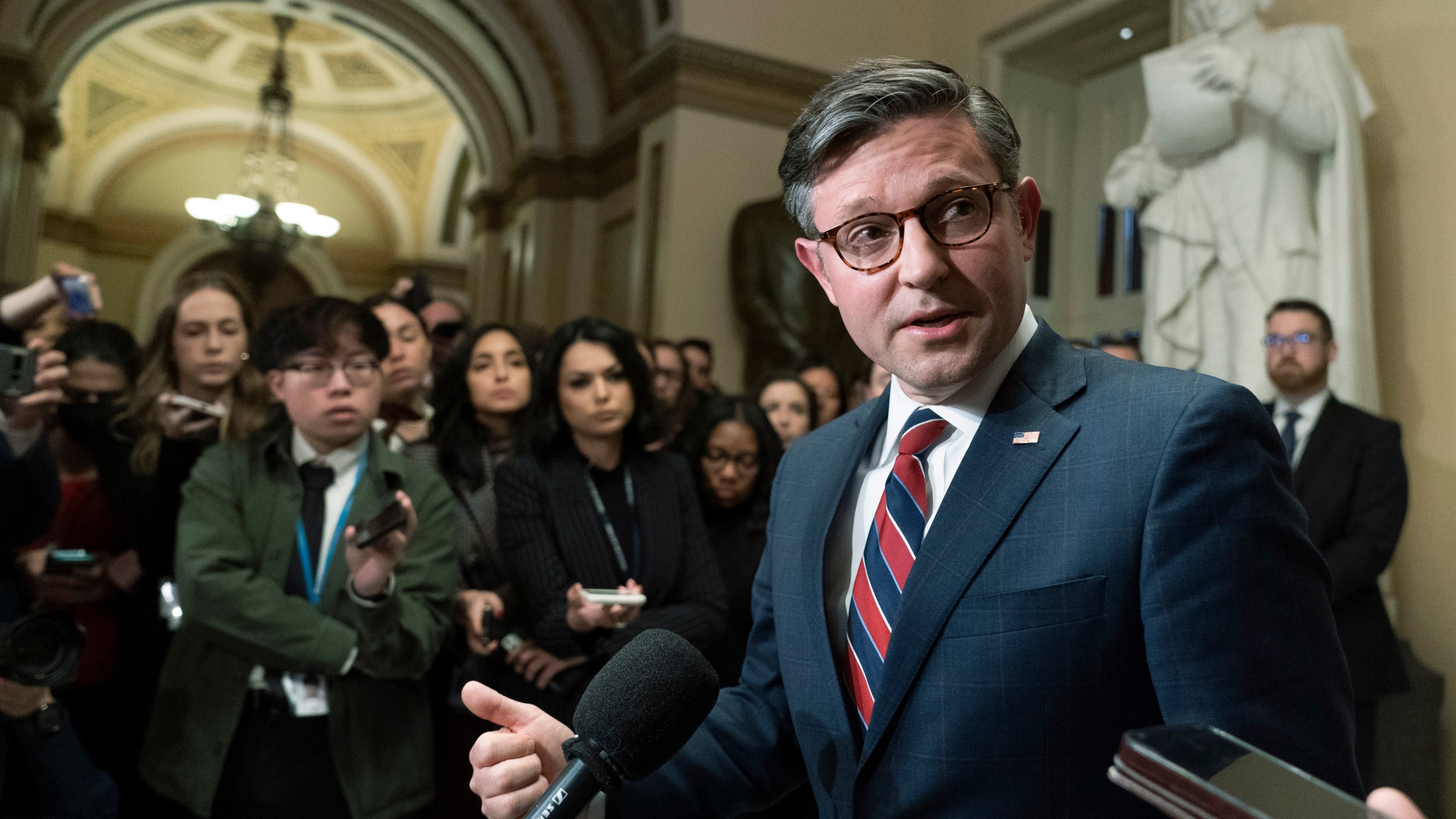 House Speaker Mike Johnson of La., speaks to reporters following a meeting with Ukrainian President Volodymyr Zelenskyy, at the Capitol, Tuesday, Dec. 12, 2023, in Washington. (AP Photo/Manuel Balce Ceneta)