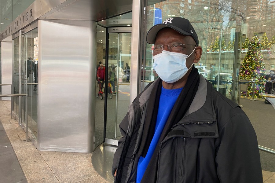 Taikwan Wright waits outside while his nephew is treated for asthma in the ICU in Bellevue Hospital in New York on Wednesday, Jan. 3, 2023. The previous week, New York City resumed a mask mandate for the city’s 11 public hospitals. (AP Photo/Mary Conlon)