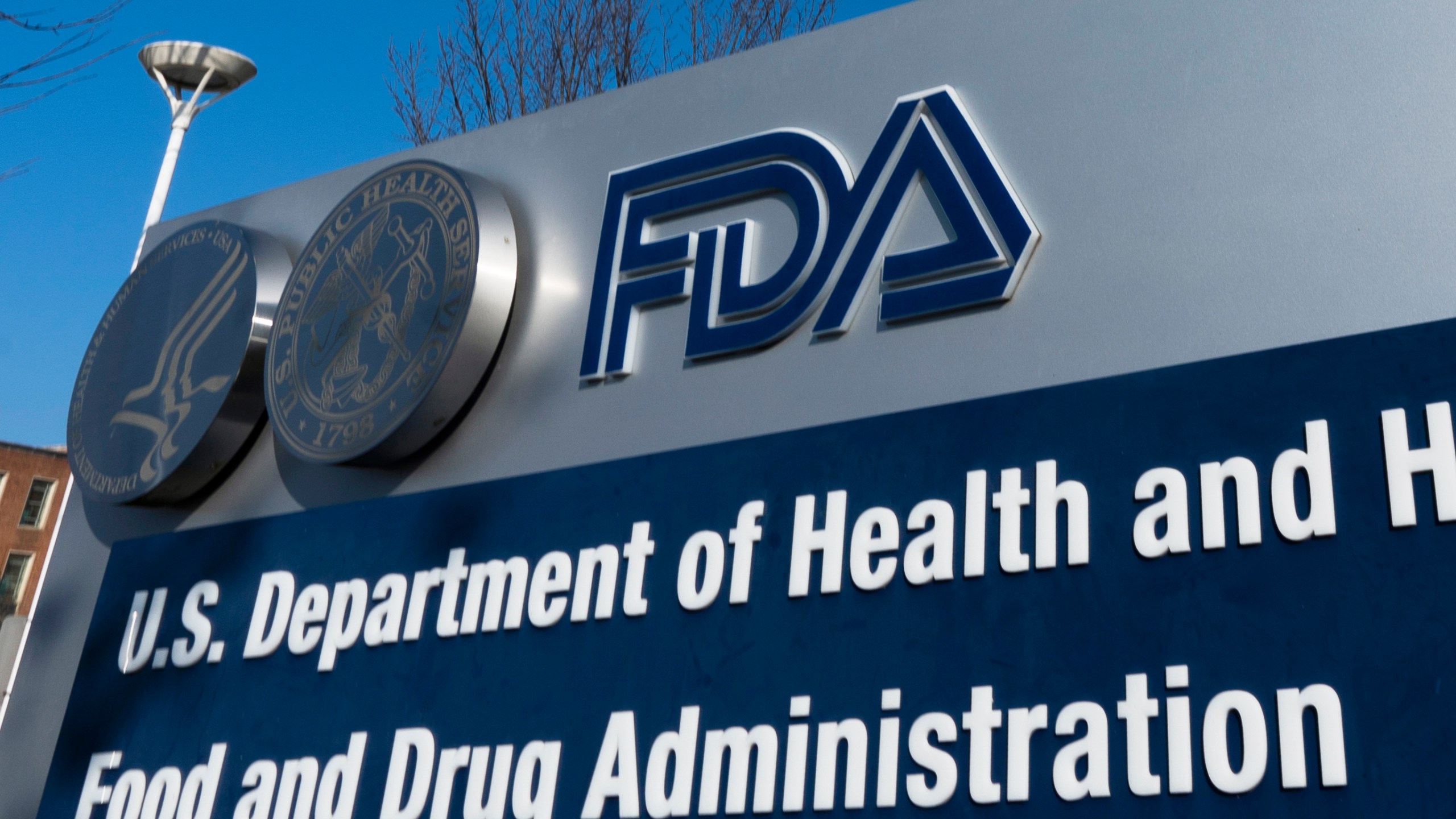 FILE - A sign for the U.S. Food and Drug Administration is displayed outside their offices in Silver Spring, Md., Dec. 10, 2020. Drug Administration announced Friday, Jan. 5, 2024, that it will allow Florida to import some prescription drugs from Canada. (AP Photo/Manuel Balce Ceneta, File)