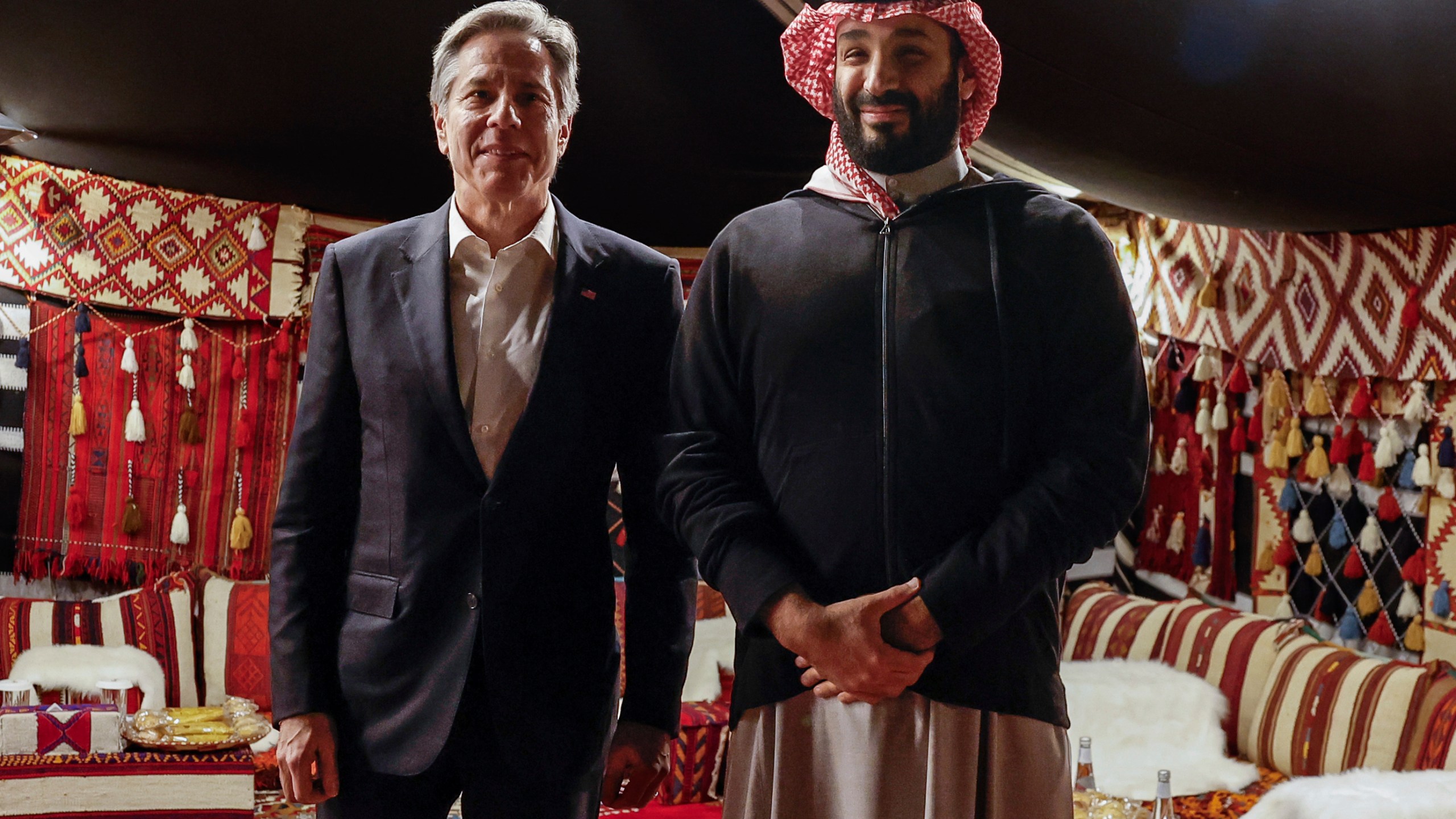 U.S. Secretary of State Antony Blinken meets with Saudi Crown Prince Mohammed bin Salman during his week-long trip aimed at calming tensions across the Middle East, in Al Ula, Saudi Arabia, Monday, Jan. 8, 2024. (Evelyn Hockstein/Pool Photo via AP)