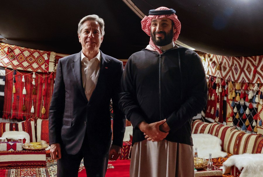 U.S. Secretary of State Antony Blinken meets with Saudi Crown Prince Mohammed bin Salman during his week-long trip aimed at calming tensions across the Middle East, in Al Ula, Saudi Arabia, Monday, Jan. 8, 2024. (Evelyn Hockstein/Pool Photo via AP)