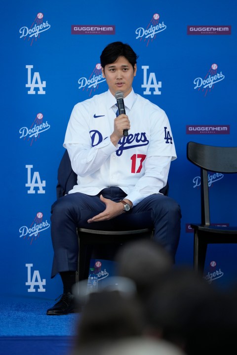 Los Angeles Dodgers' Shohei Ohtani answers questions during a baseball news conference at Dodger Stadium Thursday, Dec. 14, 2023, in Los Angeles. (AP Photo/Ashley Landis)