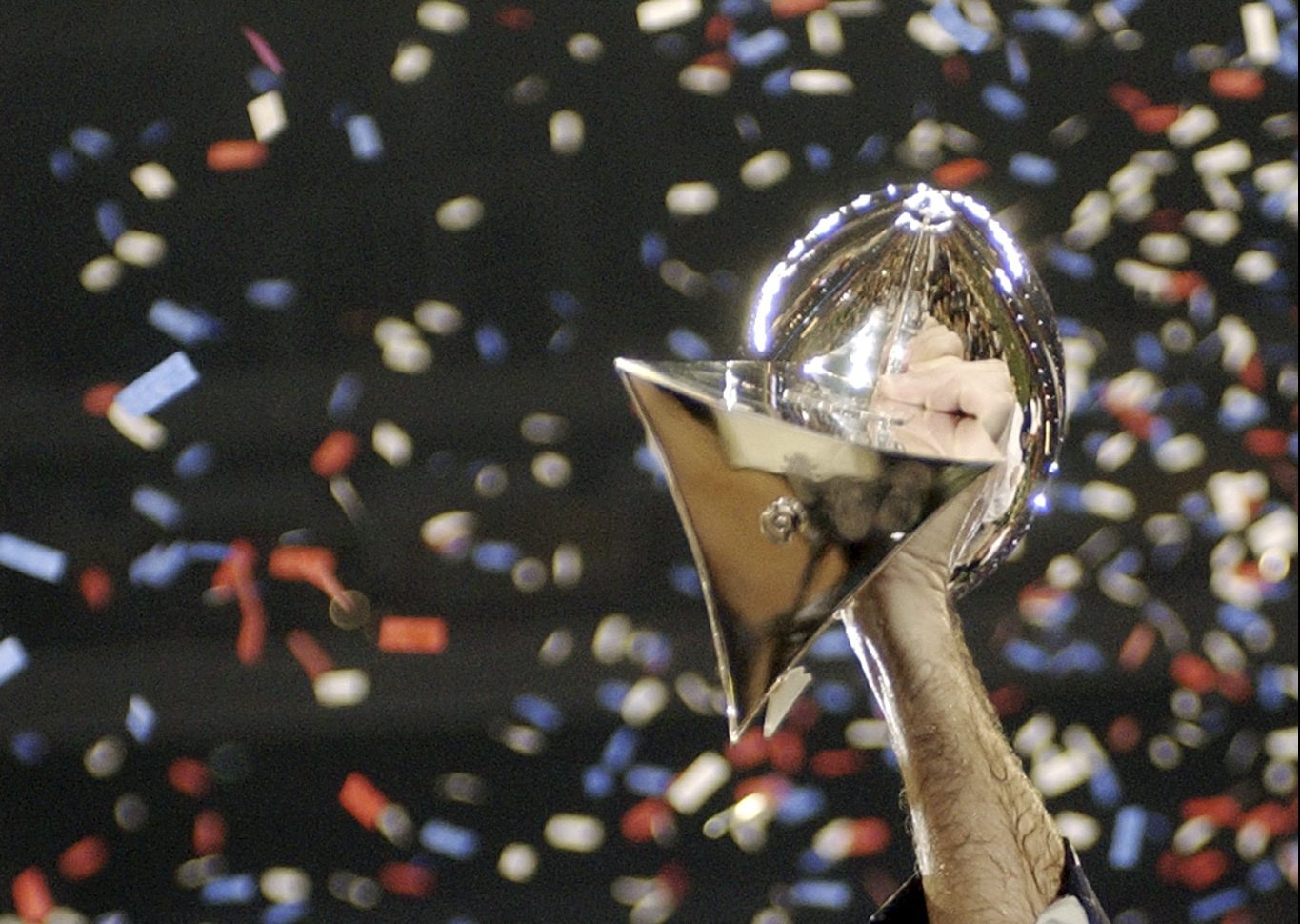 FILE - New England Patriots coach Bill Belichick holds the Vince Lombardi Trophy after the Patriots beat the Carolina Panthers 32-29 in Super Bowl XXXVIII in Houston, Texas, Feb. 1, 2004. Six-time NFL champion Bill Belichick has agreed to part ways as the coach of the New England Patriots on Thursday, Jan. 11, 2024, bringing an end to his 24-year tenure as the architect of the most decorated dynasty of the league’s Super Bowl era, a source told the Associated Press on the condition of anonymity because it has not yet been announced. (AP Photo/Dave Martin, File)