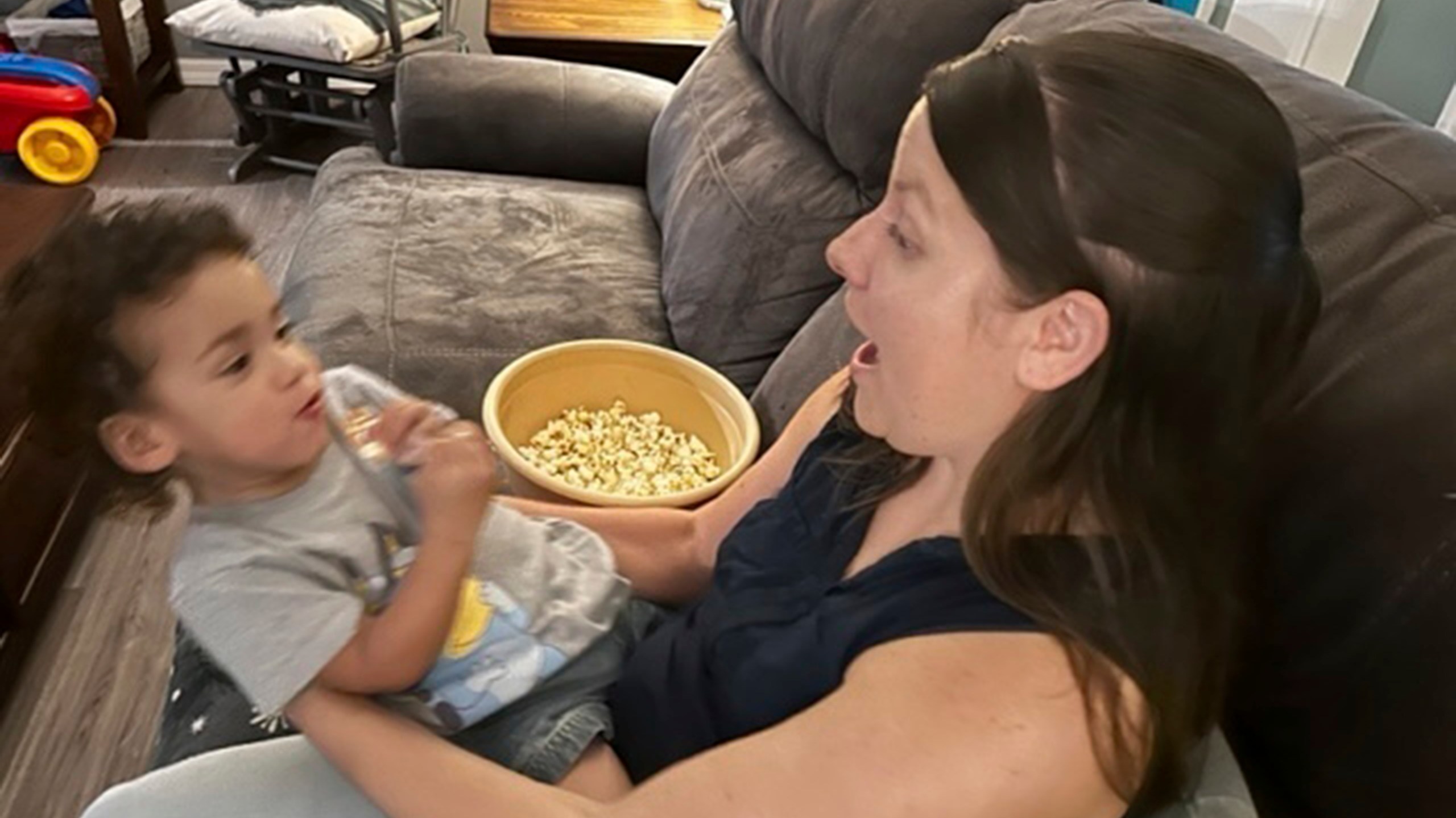 Megan Cherry plays with her two-year-old son on the couch in their home in Temple Terrace, Fla., on Tuesday, Jan. 9, 2024. Cherry is among millions of Americans who are feeling the ongoing impacts of inflation. (AP Photo/Laura Bargfeld)