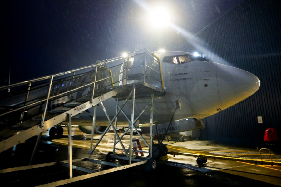 File - An Alaska Airlines Boeing 737 Max 9 aircraft awaits inspection outside the airline's hangar at Seattle-Tacoma International Airport Wednesday, Jan. 10, 2024, in SeaTac, Wash. The Federal Aviation Administration says it will audit Boeing's aircraft production and increase oversight of the troubled company after a panel blew off a jetliner in midflight last week. (AP Photo/Lindsey Wasson, File)