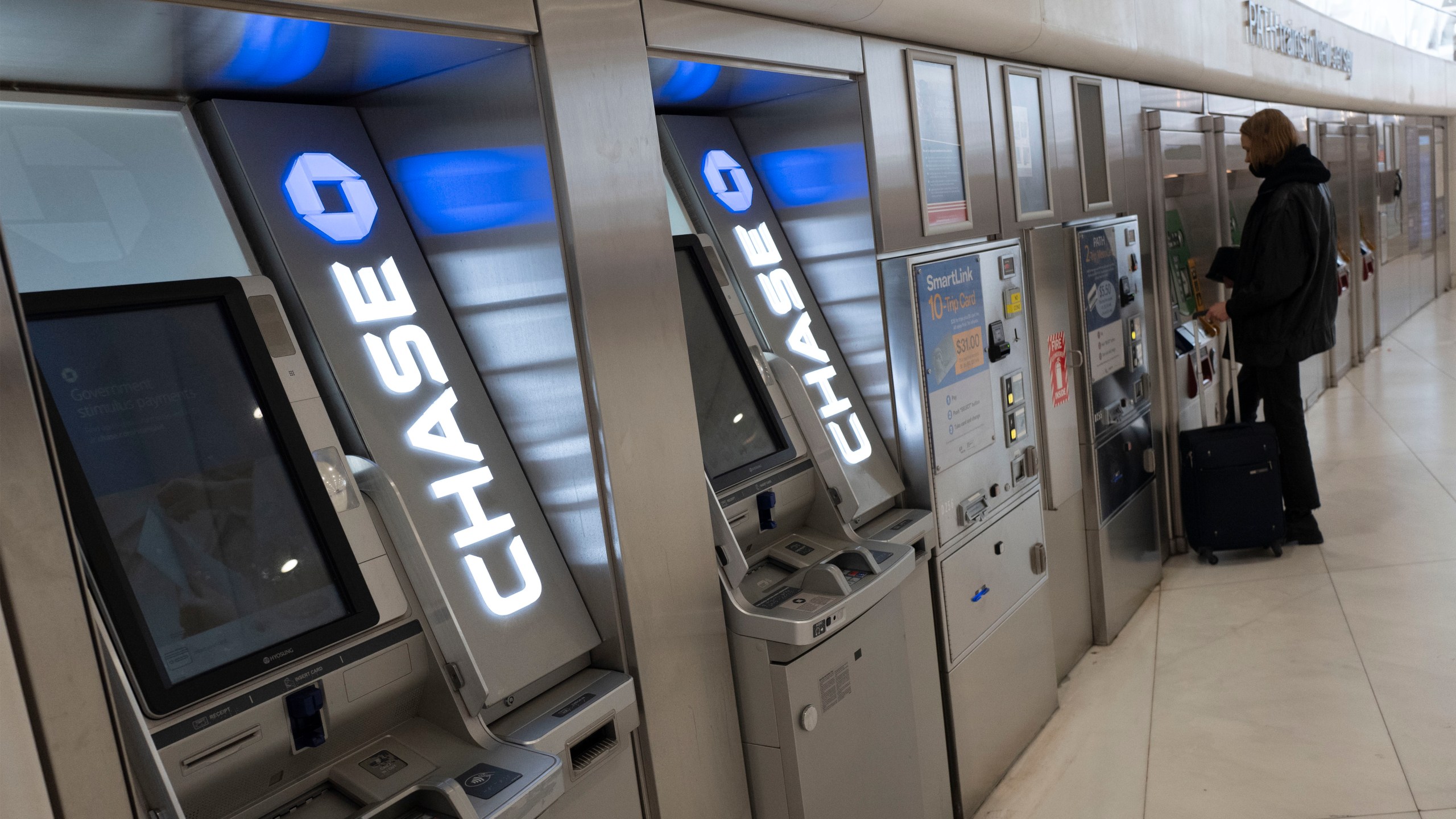 FILE - Chase Bank ATMs are shown, Thursday, March 25, 2021, in New York. (AP Photo/Mark Lennihan, File)