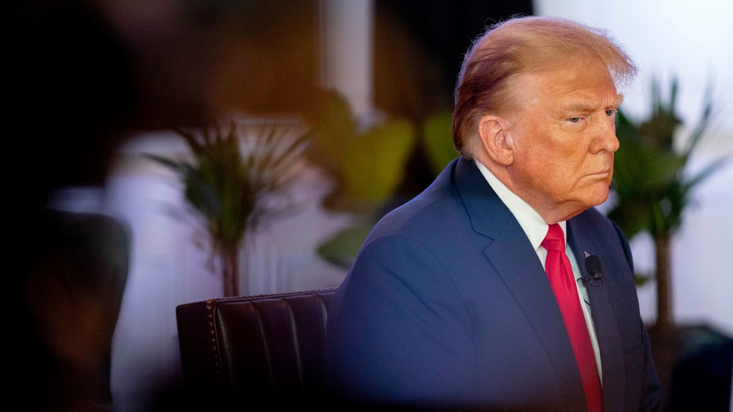 FILE - Republican presidential candidate former President Donald Trump participates in a virtual rally at Hotel Fort Des Moines in Des Moines, Iowa, Saturday, Jan. 13, 2024. A federal judge said Sunday, Jan. 14, that Trump can wait a week to testify at a New York defamation trial where he could face millions of dollars in damages after a jury concluded that he sexually abused columnist E. Jean Carroll in the 1990s. (AP Photo/Andrew Harnik, File)