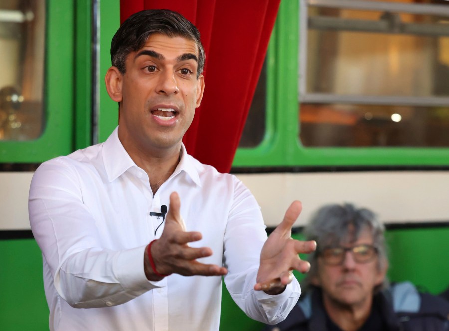 Britain's Prime Minister Rishi Sunak gestures during his visit to The Boatyard in Leigh-on-Sea, Essex, England, Monday Jan. 15, 2024. (Phil Harris/Pool Photo via AP)