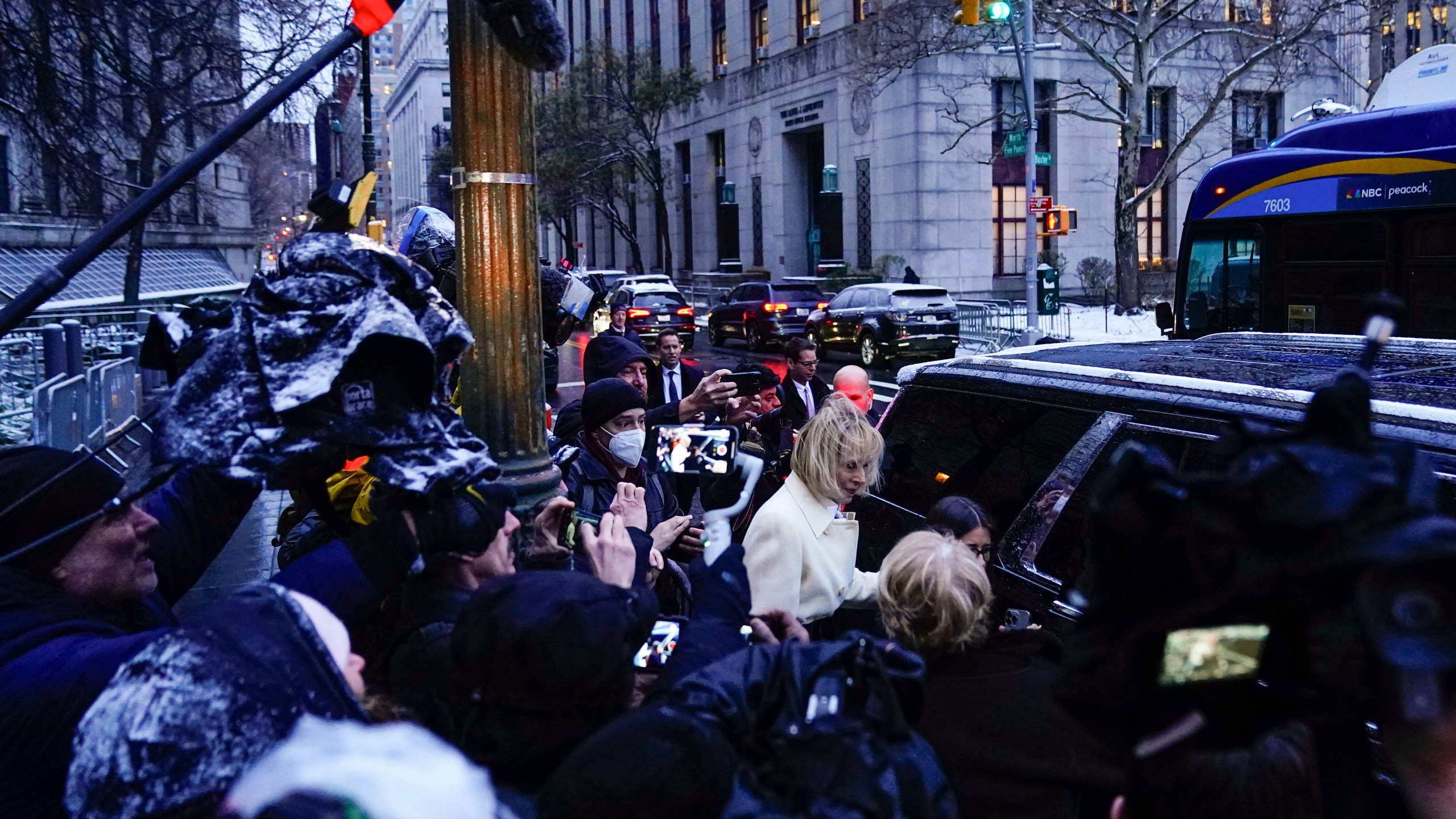 E. Jean Carroll, center, leaves Manhattan federal court following her defamation trial against former President Donald Trump, Tuesday, Jan. 16, 2024, in New York. (AP Photo/Frank Franklin II)