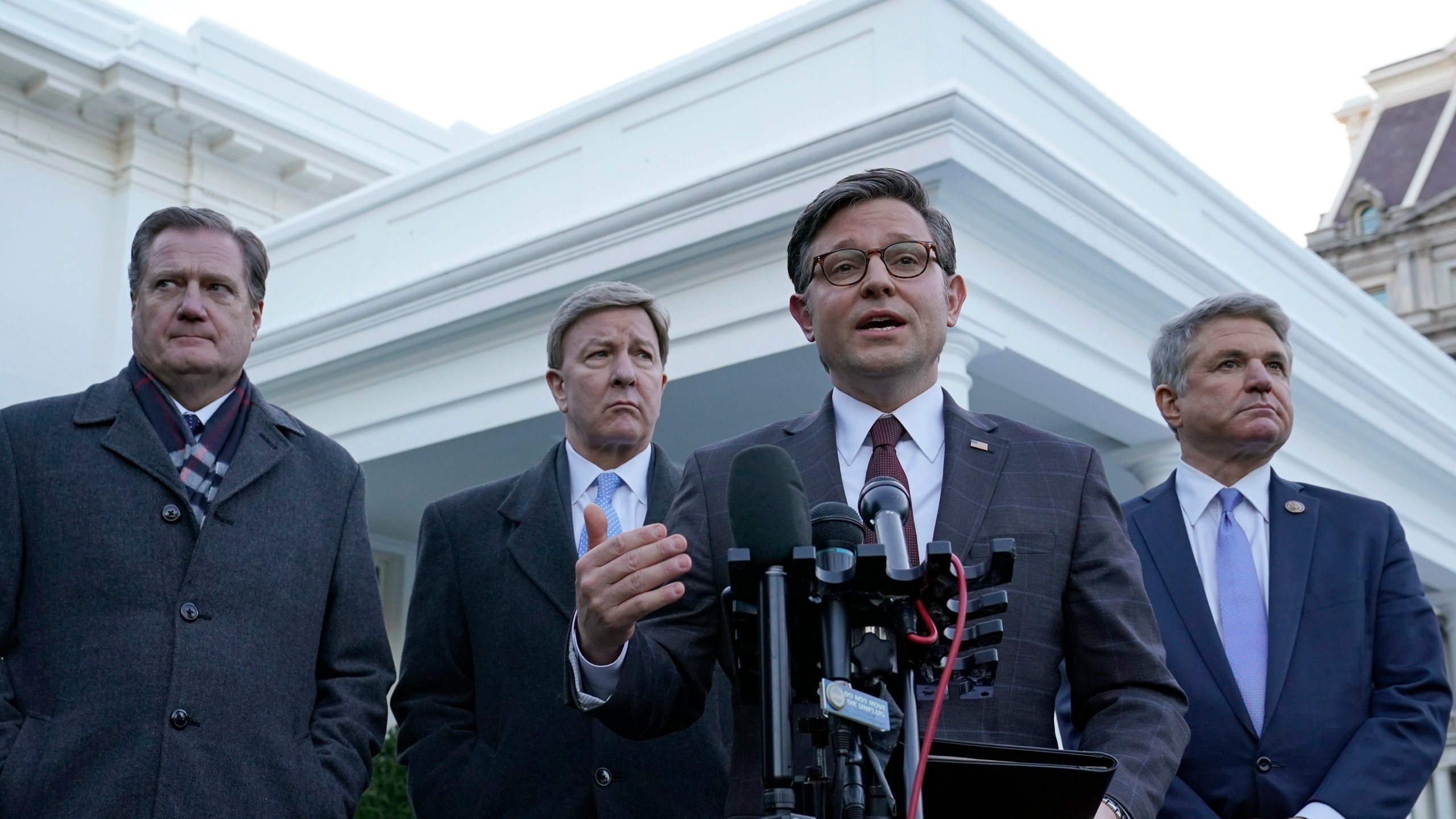 House Speaker Mike Johnson of La., second from right, flanked by, from left, Rep. Mike Turner, R-Ohio, Rep. Mike Rogers, R-Ala., and Rep. Mike McCaul, R-Texas., speaks to reporters outside the West Wing of the White House in Washington, Wednesday, Jan. 17, 2024, following their meeting with President Joe Biden. (AP Photo/Susan Walsh)