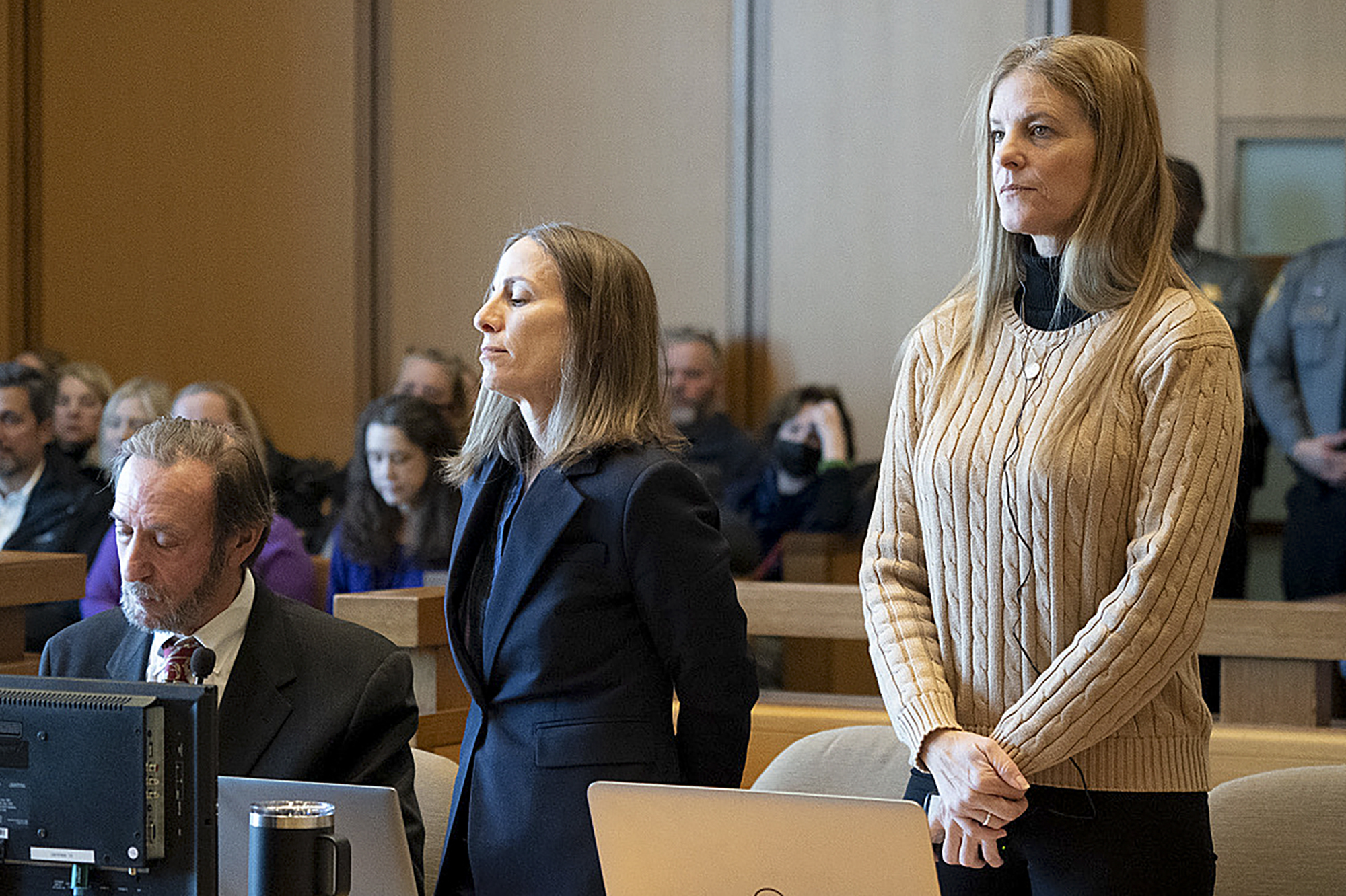 Michelle Troconis listens to arguments at the start of her trial, Thursday, Jan. 11, 2024, in Stamford, Conn. The trial of Troconis, charged in the 2019 killing of mother-of-five Jennifer Dulos, has begun in Stamford Superior Court with a six-person jury hearing the case.(Richard Harbus/Dailly Mail via AP, Pool)