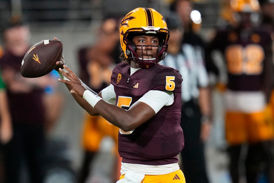 FILE - Arizona State quarterback Jaden Rashada looks for a receiver during the team's NCAA college football game against Southern Utah on Sept. 1, 2023, in Tempe, Ariz. Florida is under NCAA investigation a year after a failed name, image and likeness deal worth more than $13 million with former signee Rashada. Rashada signed with Florida last December only to be granted his release a month later after his NIL deal fell through. He later signed with Arizona State. (AP Photo/Ross D. Franklin, File)