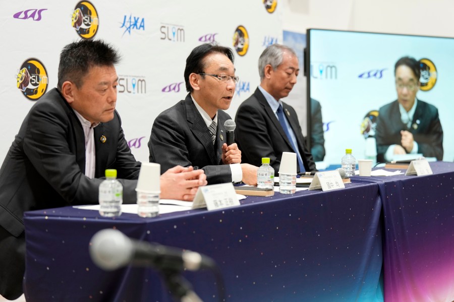 Representatives of Japan Aerospace Exploration Agency (JAXA) Masaki Fujimoto, left, Hitoshi Kuninaka, center, and Hiroshi Yamakawa, right, attend a press conference on the pinpoint moon landing operation by the Smart Lander for Investigating Moon (SLIM) spacecraft at JAXA's Sagamihara Campus Saturday, Jan. 20, 2024, in Sagamihara near Tokyo. Japan's space agency said early Saturday that its spacecraft is on the moon, but is still "checking its status." More details will be given at a news conference, officials said. (AP Photo/Eugene Hoshiko)