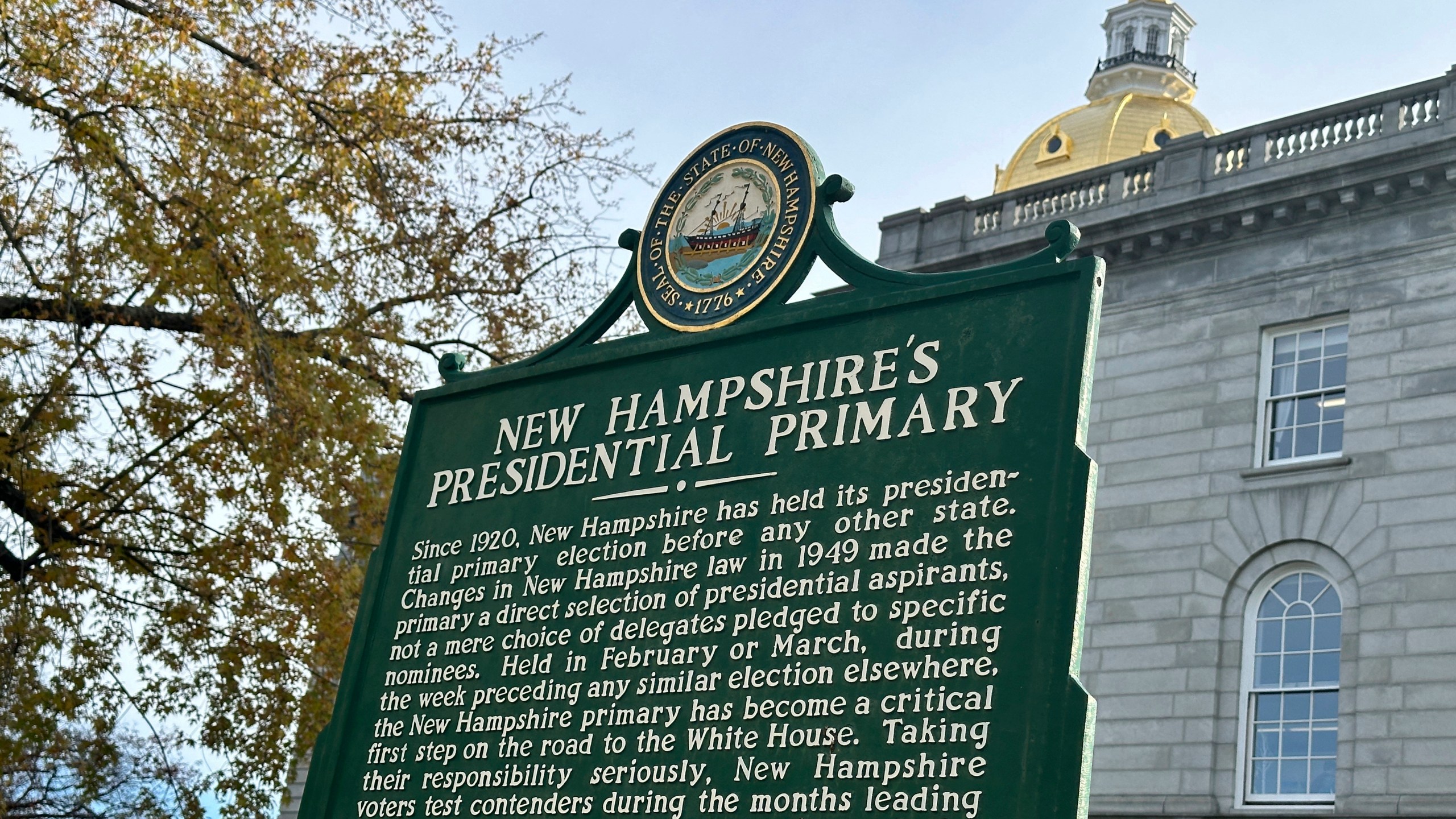 FILE - A marker stands outside the Statehouse in Concord, N.H., Nov. 15, 2023, describing the history of the state's first-in-the-nation presidential primary. New Hampshire's attorney general Monday, Jan. 8, 2024, ordered national Democratic party leaders to stop calling the state’s unsanctioned presidential primary “meaningless,” saying do so violates state law. (AP Photo/Holly Ramer, File)