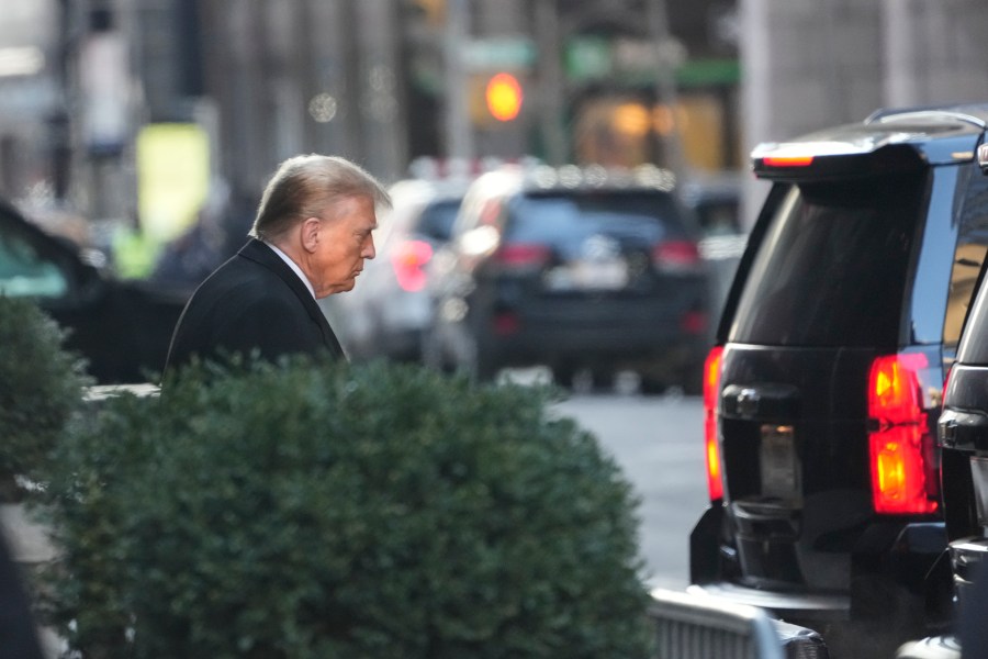 Former President Donald Trump leaves his apartment building in New York, Monday, Jan. 22, 2024. (AP Photo/Seth Wenig)