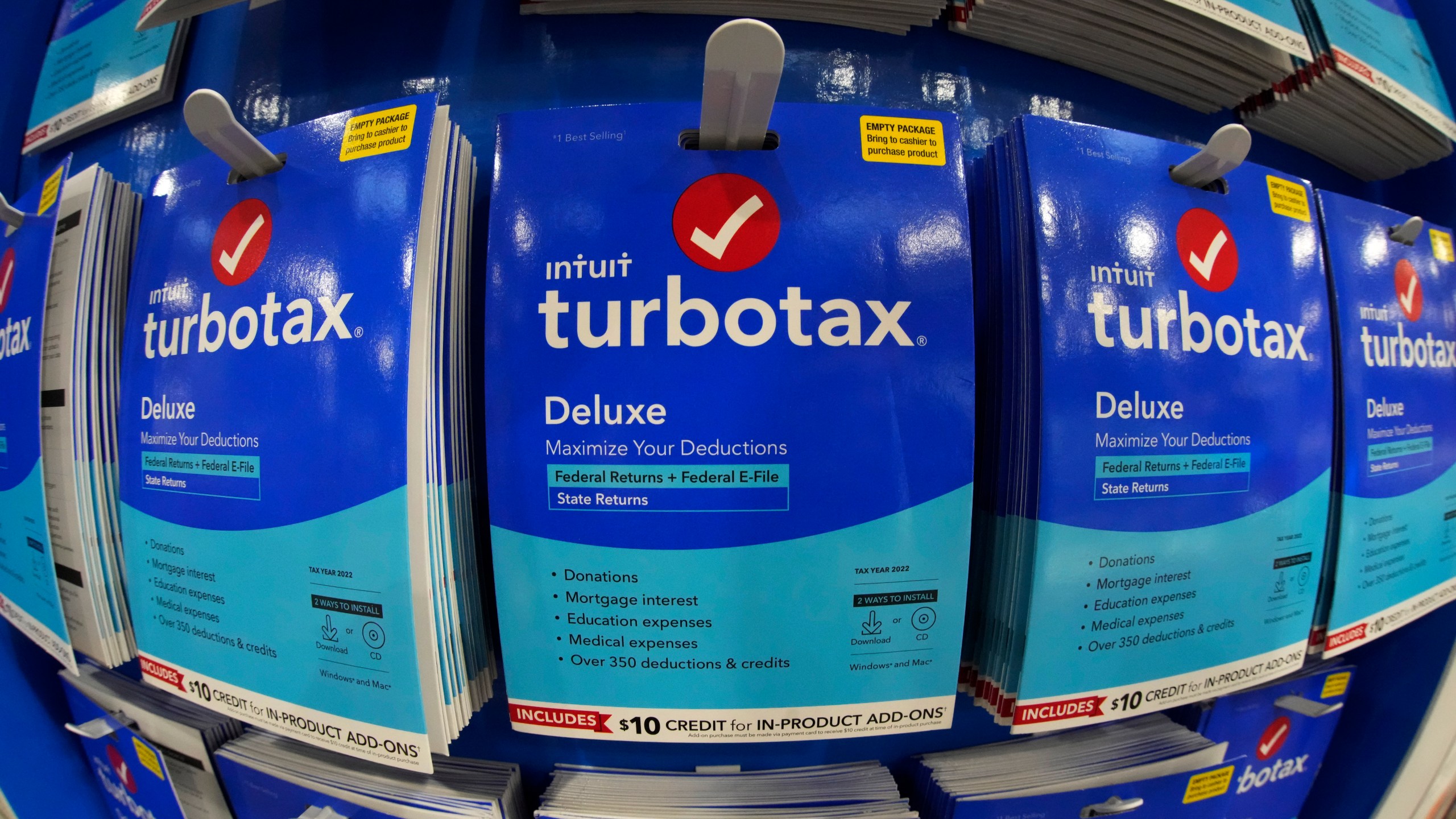 FILE - This is a display of TurboTax on display in a Costco Warehouse in Pittsburgh on Thursday, Jan. 26, 2023. U.S. regulators have barred TurboTax maker Intuit Inc. from advertising its services as “free” unless they are free for all customers, or if eligibility is clearly disclosed. In an opinion and final order, the Federal Trade Commission ruled that Intuit engaged in deceptive practices by running ads claiming consumers could file their taxes for free using TurboTax — when in fact many taxpayers did not qualify for such free offerings. (AP Photo/Gene J. Puskar, File)