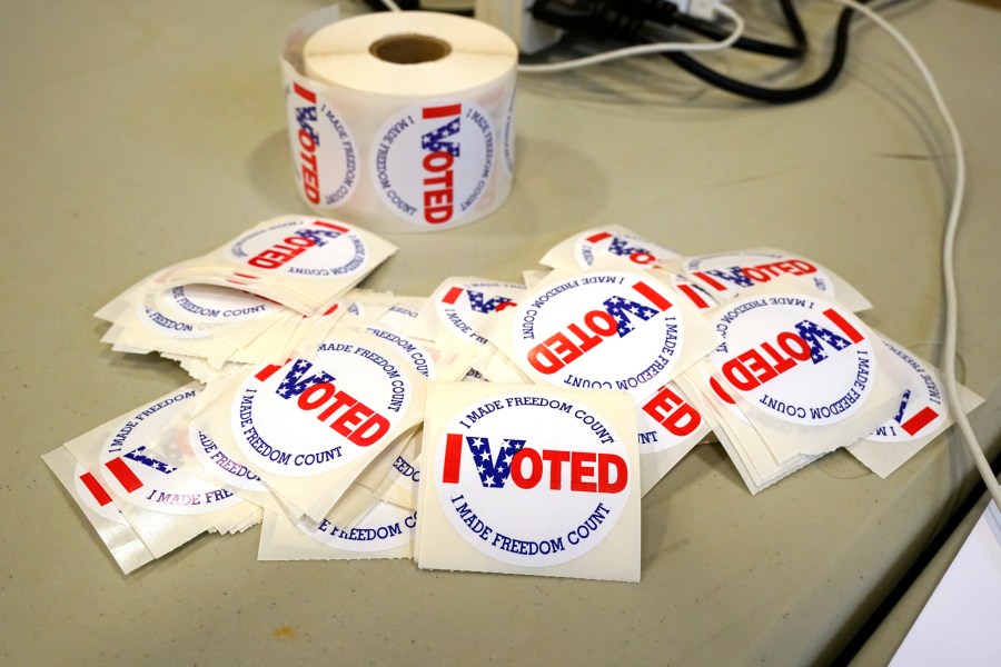 FILE _ "I Voted" stickers are ready to be distributed to each person who filled out a ballot, Tuesday, Nov. 8, 2022, in Brandon, Miss. The New Orleans-based 5th U.S. Circuit Court of Appeals was scheduled to hear arguments Tuesday, Jan. 23, 2024, over whether Mississippi can continue to permanently strip voting rights from people convicted of certain felonies. (AP Photo/Rogelio V. Solis, File)