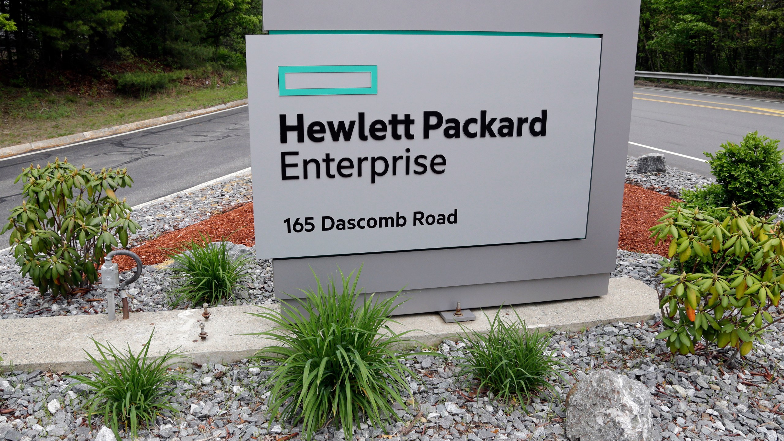 FILE - A sign marks the entry way into Hewlett Packard Enterprise, May 24, 2016, in Andover, Mass. Hewlett Packard Enterprise disclosed Wednesday, Jan. 24, 2024, that suspected state-backed Russian hackers broke into its cloud-based email system and stole data from cybersecurity and other employees. (AP Photo/Elise Amendola, File)