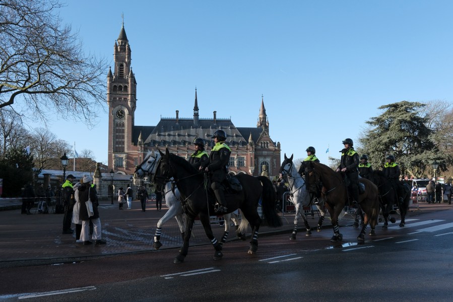 Police are on horsebacks outside the Peace Palace, which houses the International Court of Justice, or World Court, in The Hague, Netherlands, Friday, Jan. 26, 2024. Israel is set to hear whether the United Nations' top court will order it to end its military offensive in Gaza during a case filed by South Africa accusing Israel of genocide. (AP Photo/Patrick Post)