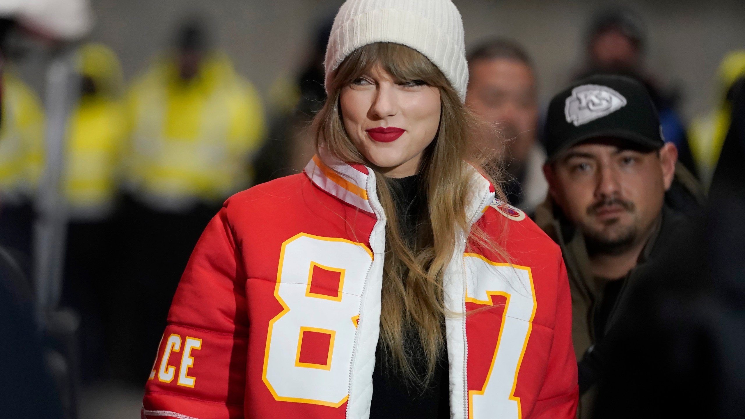 FILE - Taylor Swift wears a Kansas City Chiefs tight end Travis Kelce jacket as she arrives before an NFL wild-card playoff football game between the Chiefs and the Miami Dolphins, Saturday, Jan. 13, 2024, in Kansas City, Mo. A scourge of pornographic deepfake images generated by artificial intelligence and sexualizing people without their consent has hit its most famous victim, singer Taylor Swift, drawing attention to a problem that tech platforms and anti-abuse groups have struggled to solve. (AP Photo/Ed Zurga, File)