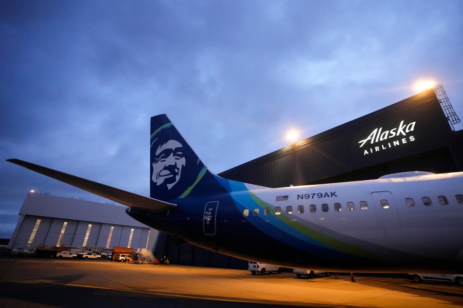 File - An Alaska Airlines Boeing 737 Max 9 awaits inspection at the airline's hangar at Seattle-Tacoma International Airport onJan. 10, 2024, in SeaTac, Wash. Alaska Airlines has begun flying Boeing 737 Max 9 jetliners again for the first time Friday, Jan. 26, since they were grounded after a panel blew out of the side of one of the airline's planes. (AP Photo/Lindsey Wasson, File)