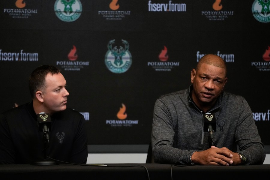 Milwaukee Bucks general manager Jon Horst listens as Doc Rivers speaks after being introduced as the Milwaukee Bucks head coach at a news conference Saturday, Jan. 27, 2024, in Milwaukee. (AP Photo/Morry Gash)