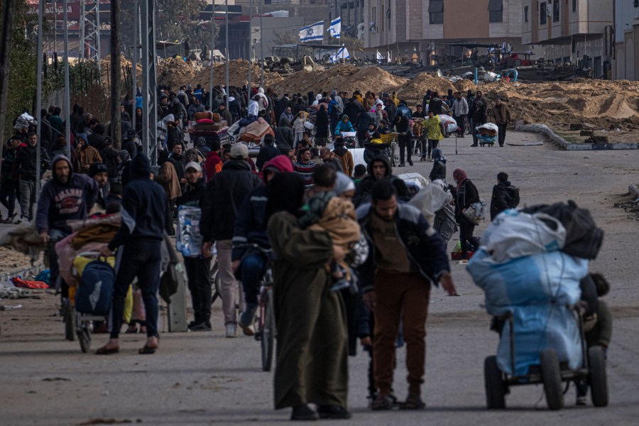 Palestinians flee Israeli ground offensive in Kahn Younis, Gaza Strip, Saturday, Jan. 27, 2024. (AP Photo/Fatima Shbair)