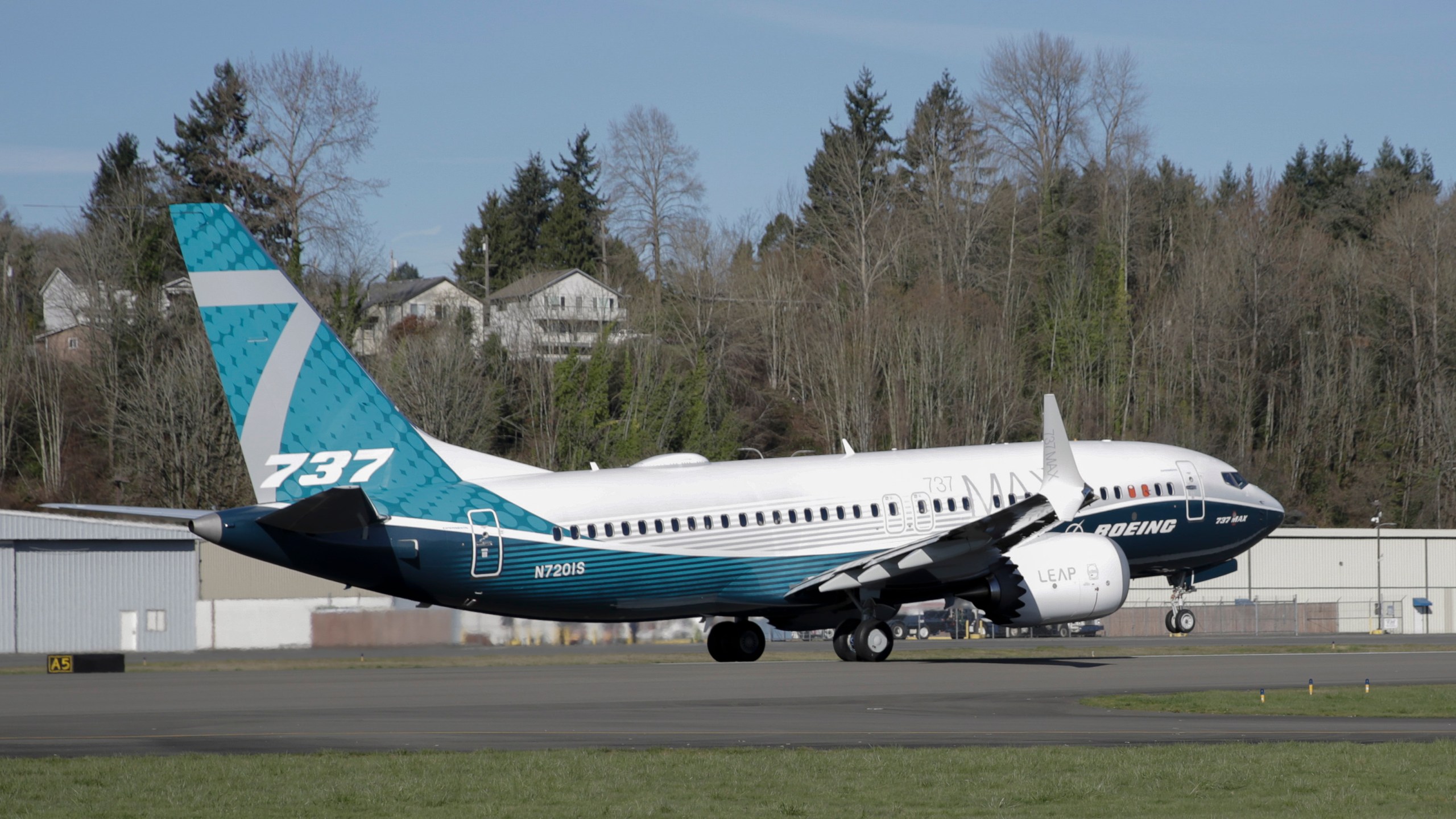 FILE - A Boeing 737 MAX 7 takes off on its first flight on March 16, 2018, in Renton, Wash. Facing severe criticism after a door plug blew out on a 737 Max over Oregon this month, Boeing said Monday, Jan. 29, 2024, that it is withdrawing a request for a safety exemption needed to certify the new model of the plane. (AP Photo/Jason Redmond, File)