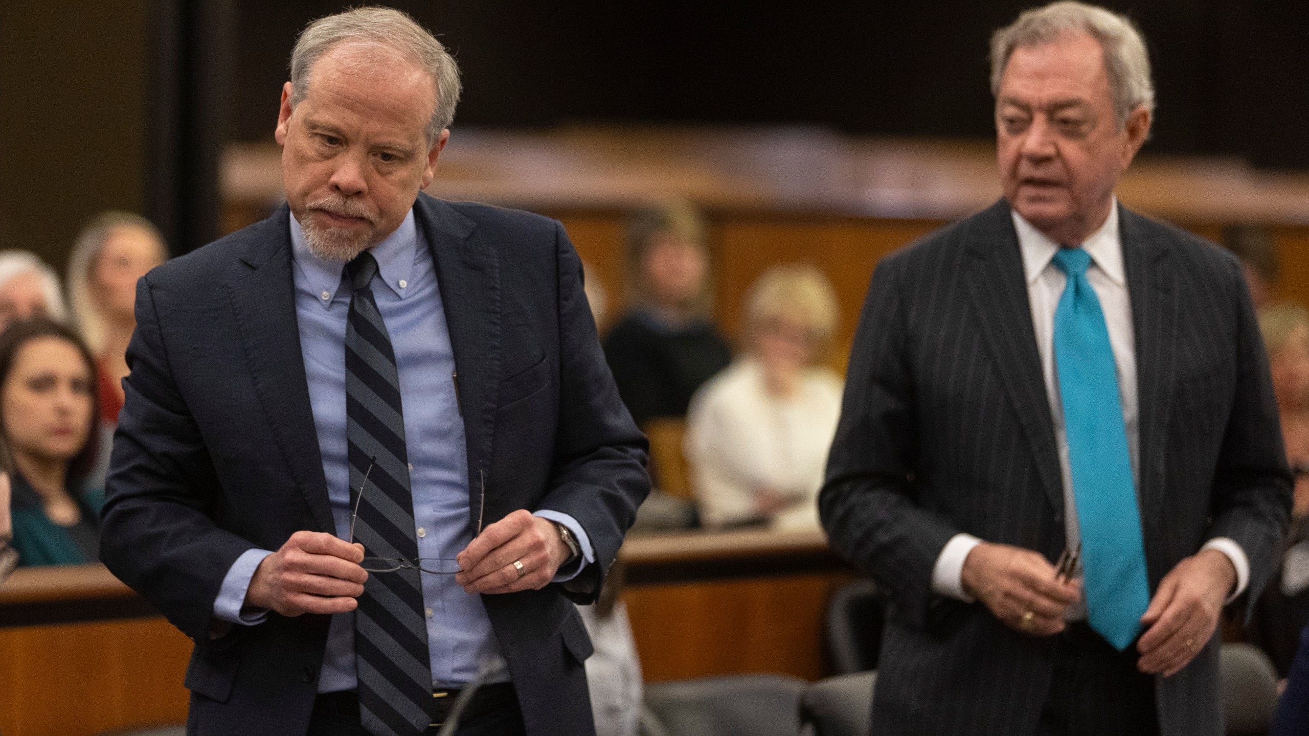 Prosecutor Creighton Waters, left, and defense attorney Dick Harpootlian stand during the Alex Murdaugh jury-tampering hearing at the Richland County Judicial Center, Monday, Jan. 29, 2024, in Columbia, S.C. (Andrew J. Whitaker/The Post And Courier via AP, Pool)