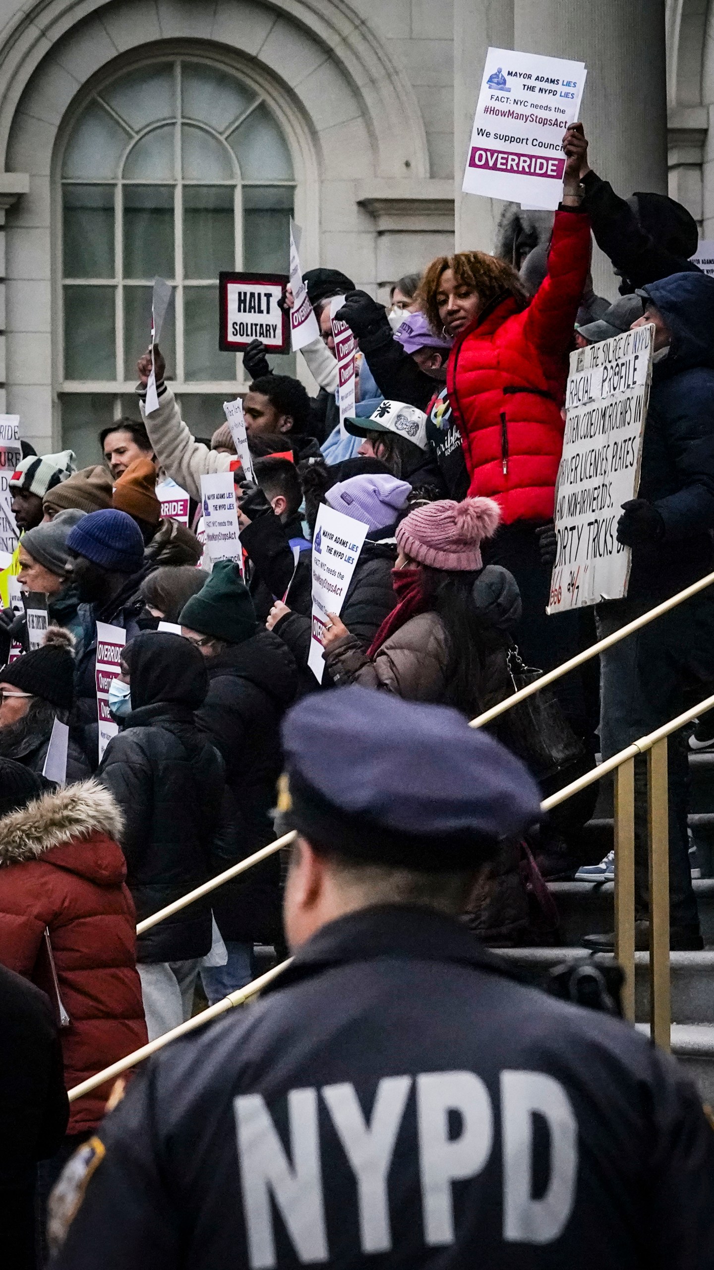 A coalition of community groups and advocates for the How Many Stops Act coalition hold a rally at City Hall, Tuesday, Jan. 30, 2024, in New York, to urge the City Council to override Mayor Adams veto of the act, requiring police officers to document basic information whenever they question someone. (AP Photo/Bebeto Matthews)