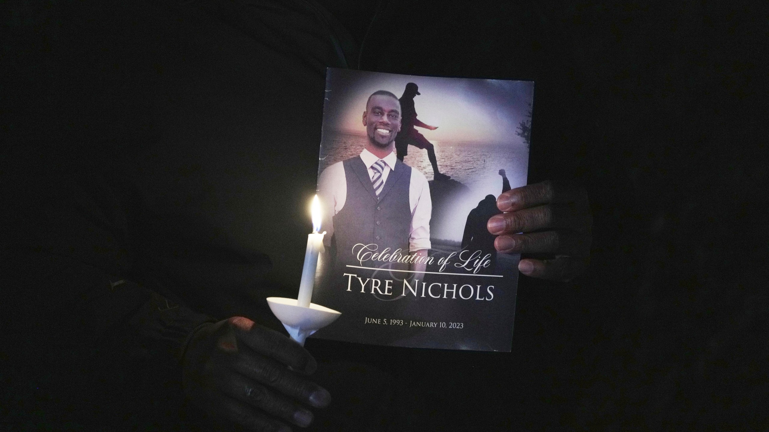 A crowd gathers to remember Tyre Nichols during a candlelight vigil on the anniversary of his death, Jan. 7, 2024, in Memphis, Tenn. The city of Memphis has released hours of more video in the case of five former police officers charged with the violent beating and death of Nichols. The recordings were released Tuesday, Jan. 30, 2024 based on a judge’s order on the same day last November that former officer Desmond Mills Jr. pleaded guilty to federal charges. (AP Photo/Karen Pulfer Focht)