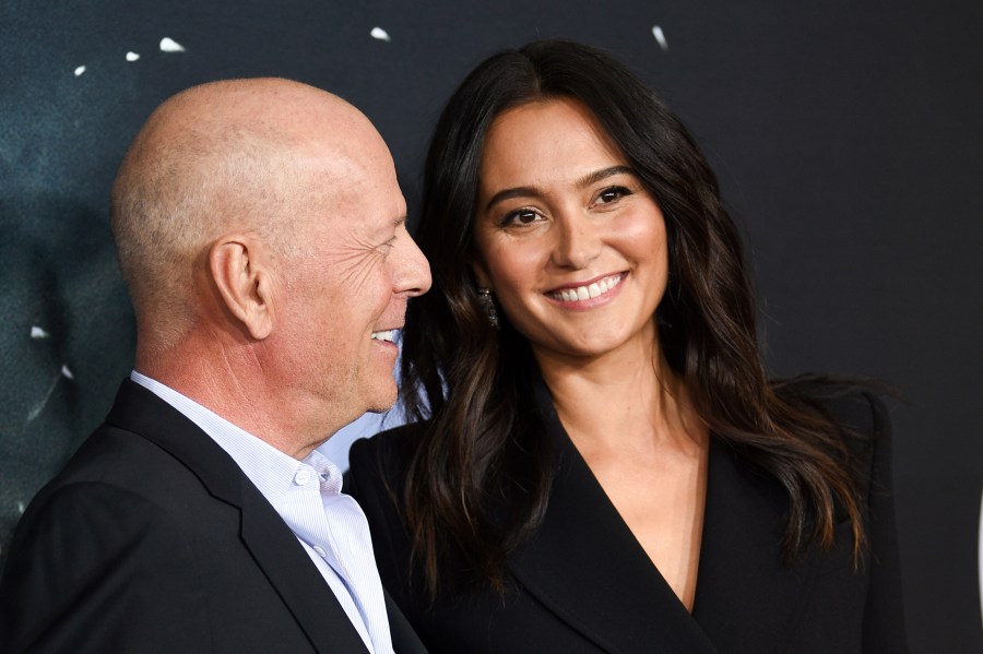 FILE - Actor Bruce Willis, left, and his wife Emma Heming Willis attend the premiere of "Glass" in New York on Jan. 15, 2019. Heming Willis is working on a guide to care giving that draws upon her experiences tending to her husband who has been diagnosed with frontotemporal dementia. The book, currently untitled, is scheduled for 2025. (Photo by Evan Agostini/Invision/AP, File)