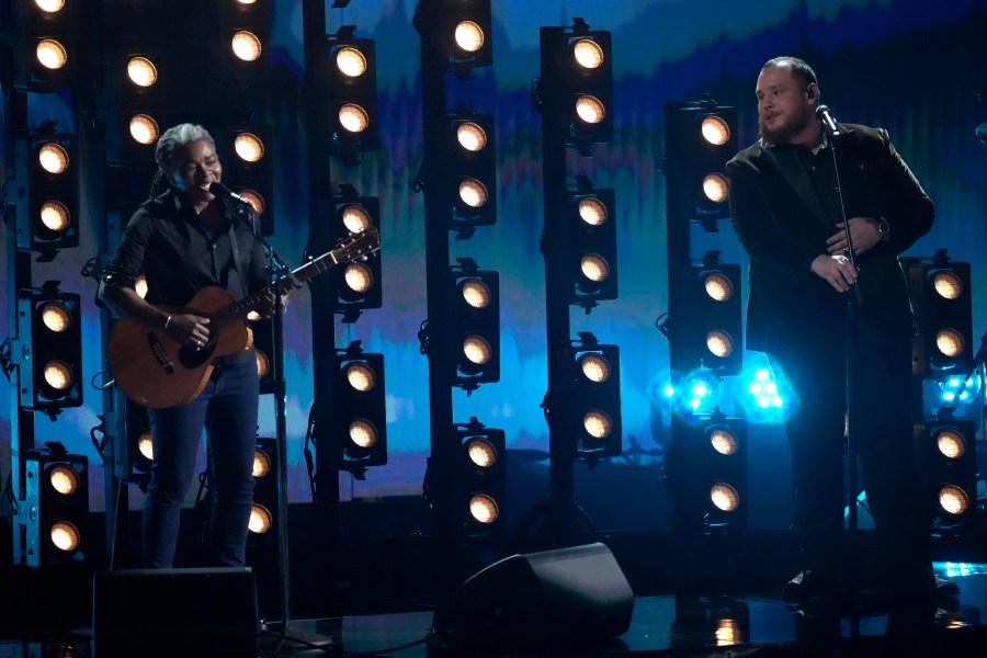 Tracy Chapman, left, and Luke Combs perform "Fast Car" during the 66th annual Grammy Awards on Sunday, Feb. 4, 2024, in Los Angeles. (AP Photo/Chris Pizzello)