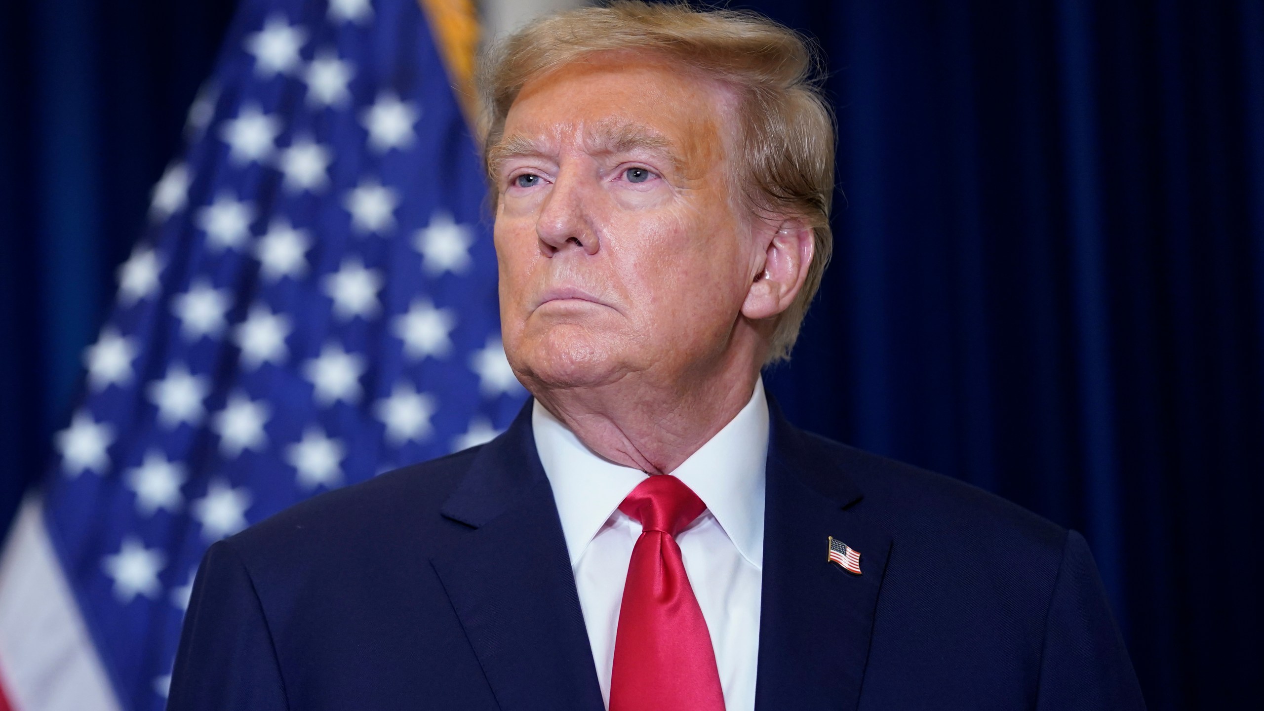 Former President Donald Trump speaks to the media at a Washington hotel, Tuesday, Jan. 9, 2024, after attending a hearing before the D.C. Circuit Court of Appeals at the federal courthouse in Washington. (AP Photo/Susan Walsh)